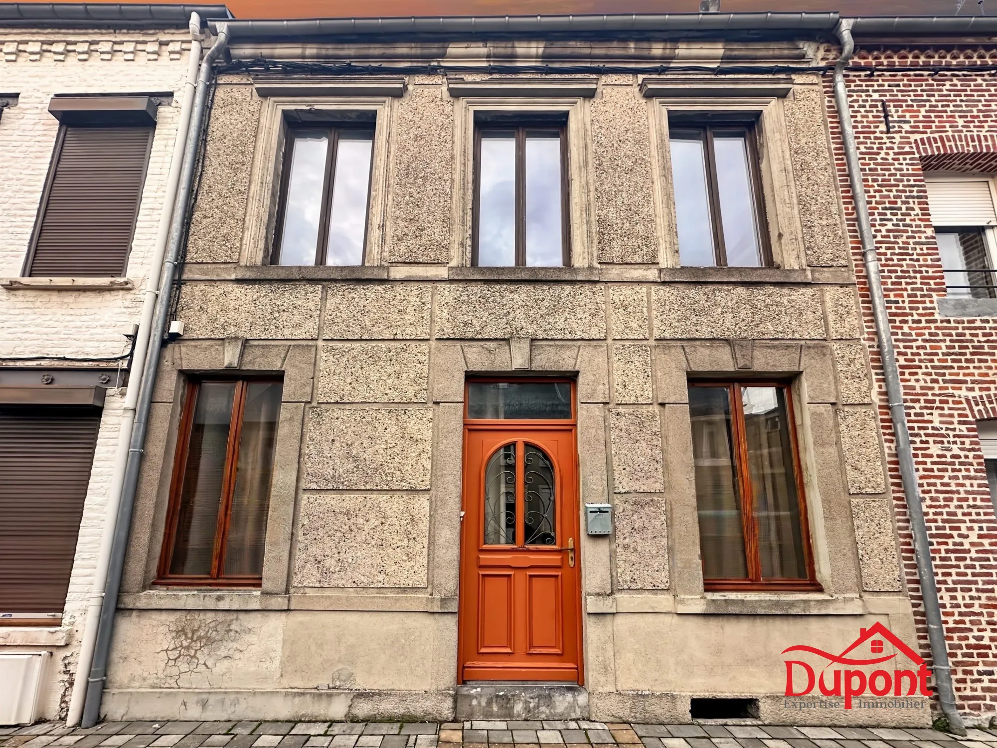 Maison avec potentiel locatif et terrain à bâtir à Berlaimont