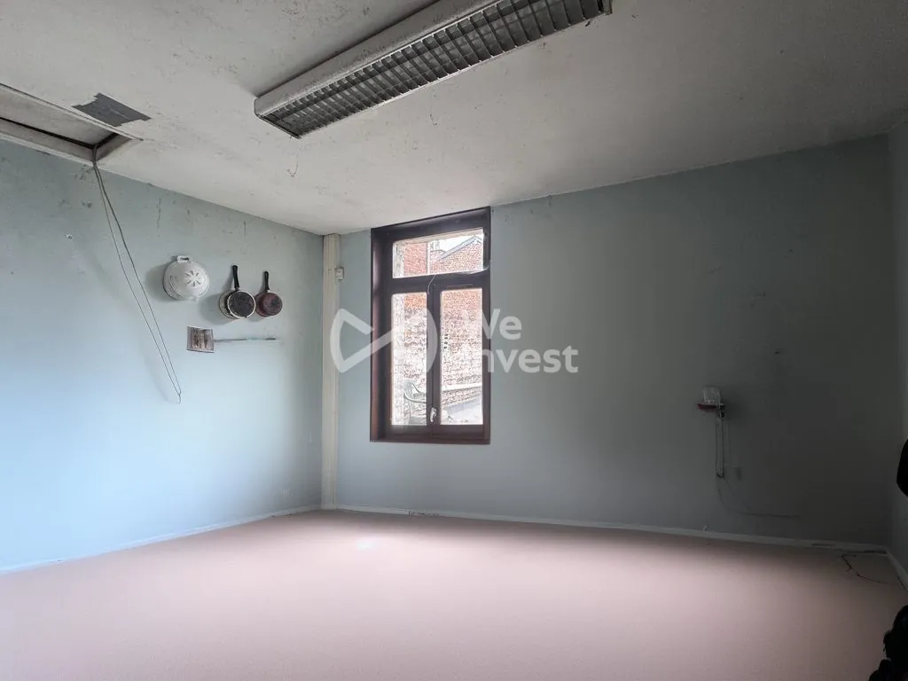 Immeuble mixte à vendre à Fourmies avec local commercial et appartement loués 