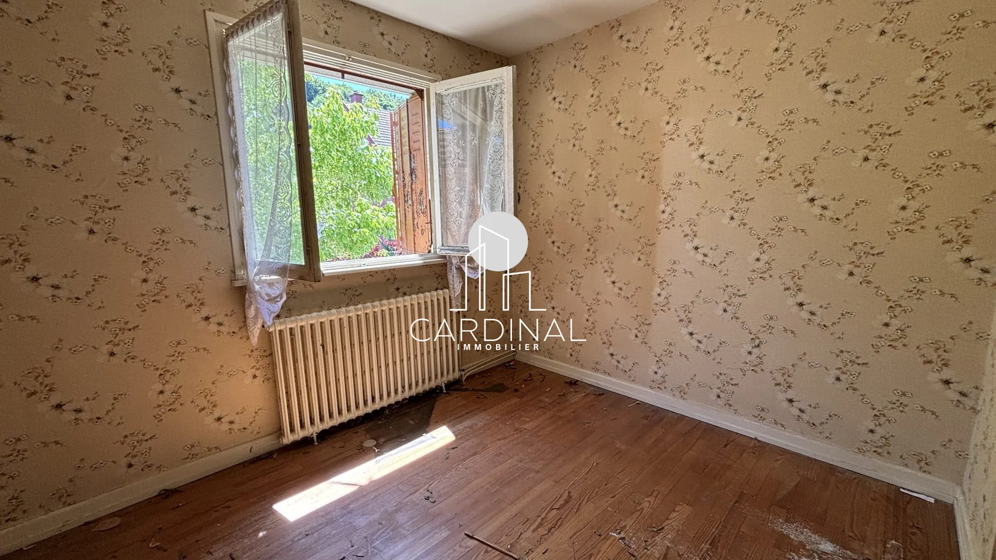 Maison à vendre à Cravanche de 77 m² avec terrain arboré et travaux à prévoir 