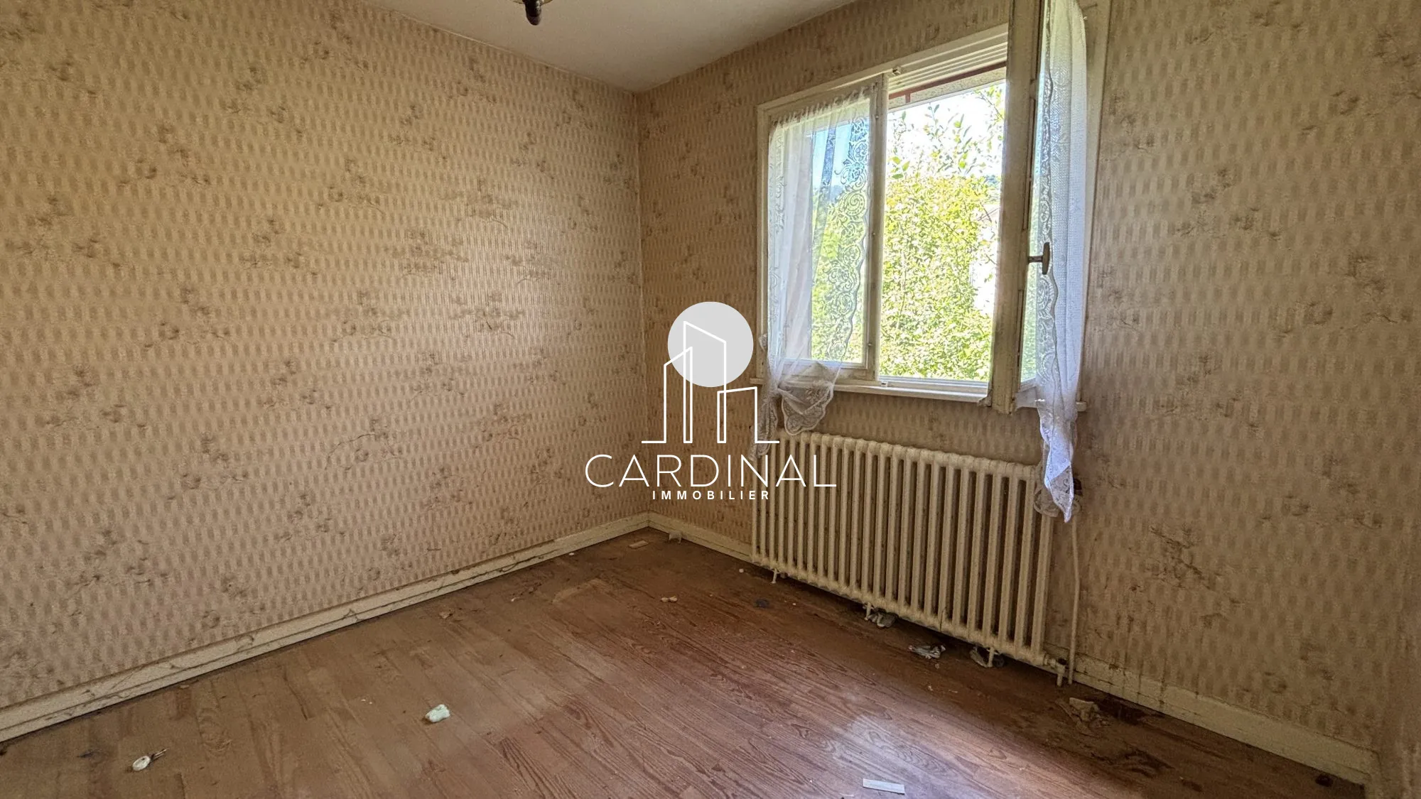 Maison à vendre à Cravanche de 77 m² avec terrain arboré et travaux à prévoir 