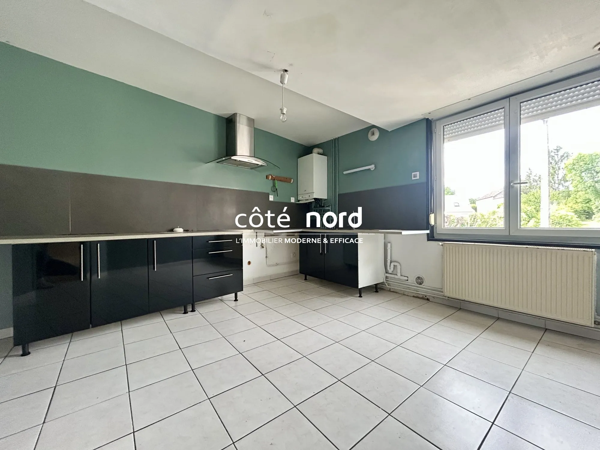 Maison semi plain-pied à vendre à Caudry - 119 m² avec jardin et dépendance