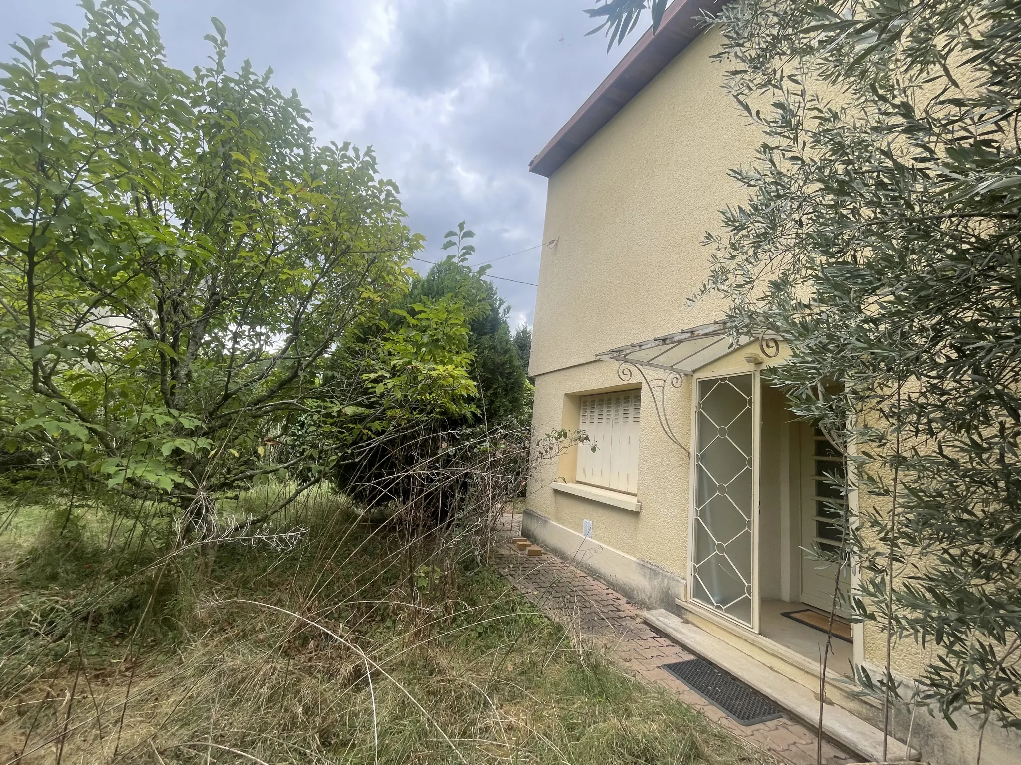 Maison T4 à vendre à Romans-sur-Isère avec garage et véranda 