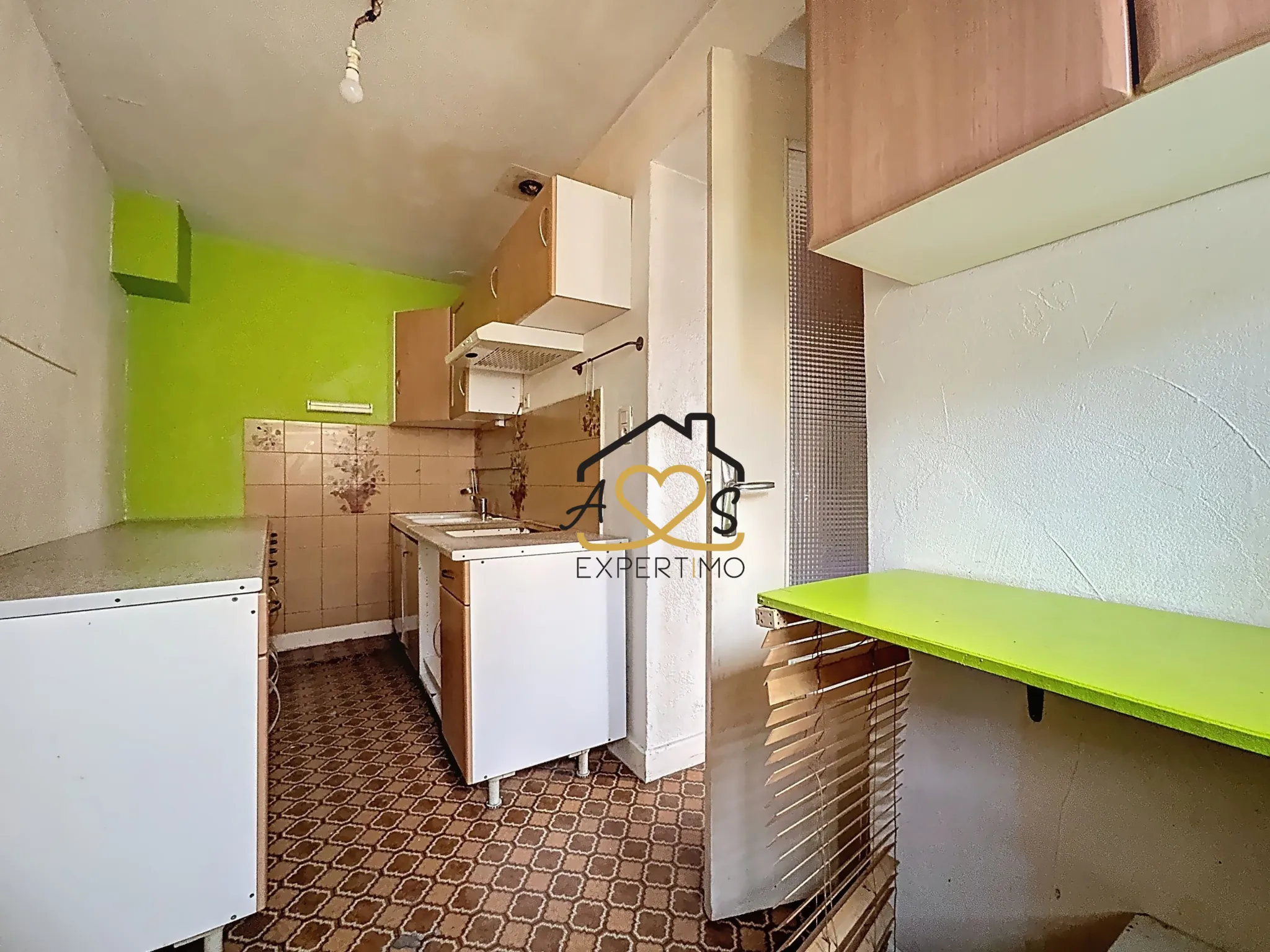 Maison de ville à rénover à Billom avec garage et annexes - 117 m² 