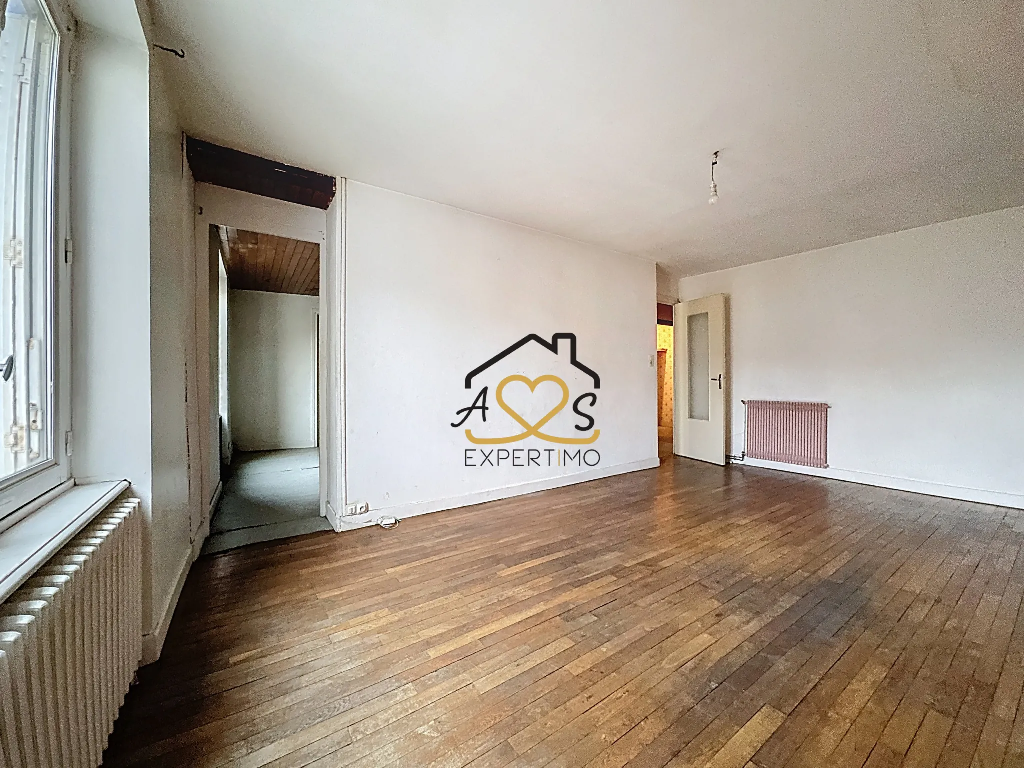 Maison de ville à rénover à Billom avec garage et annexes - 117 m² 