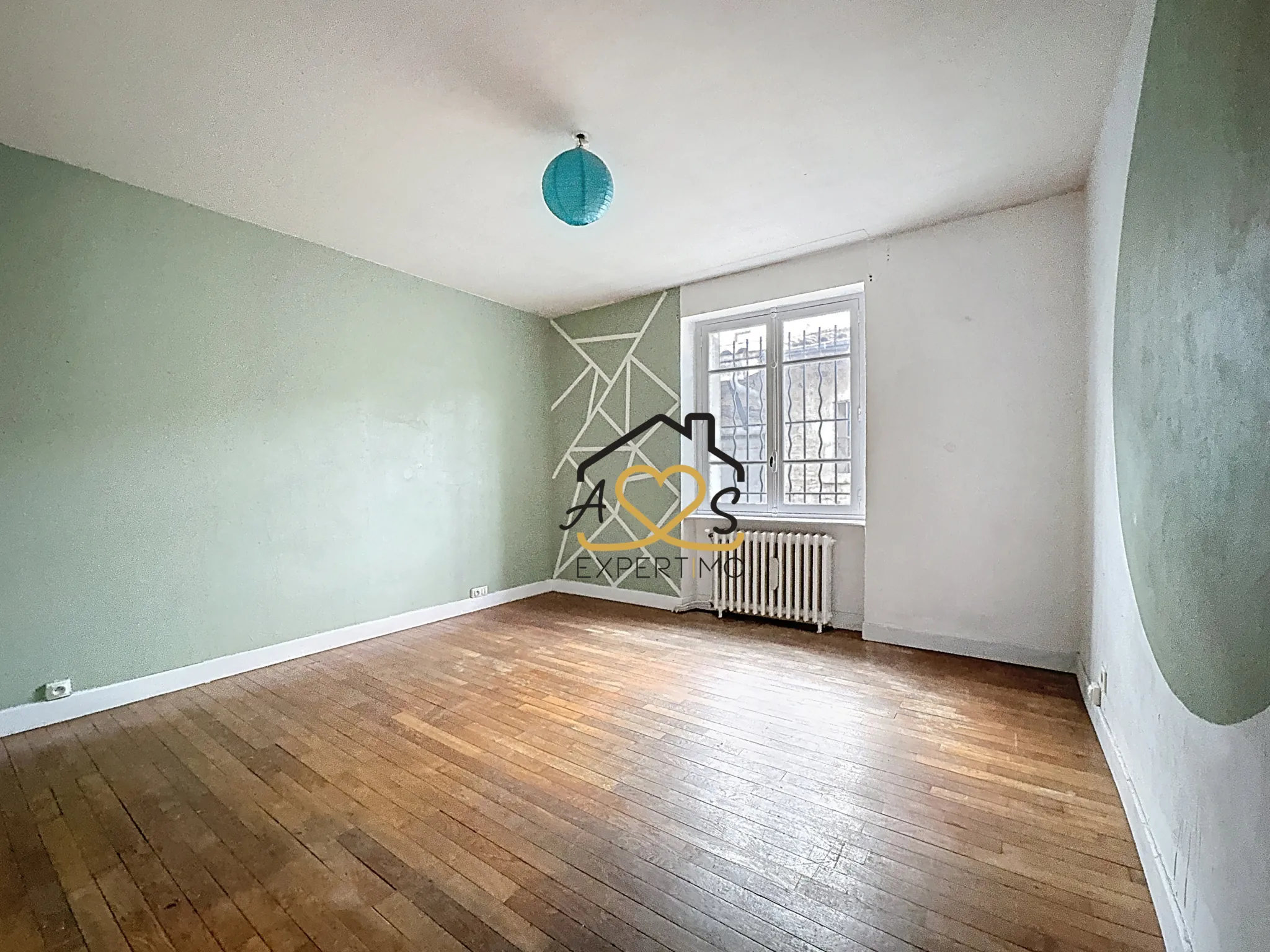 Maison de ville à rénover à Billom avec garage et annexes - 117 m² 