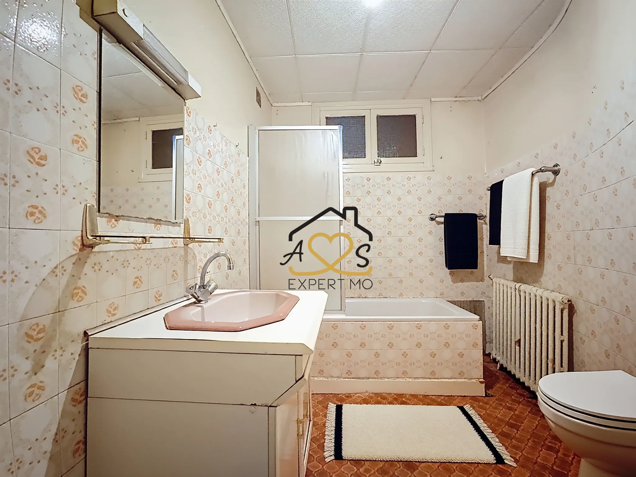 Maison de ville à rénover à Billom avec garage et annexes - 117 m² 