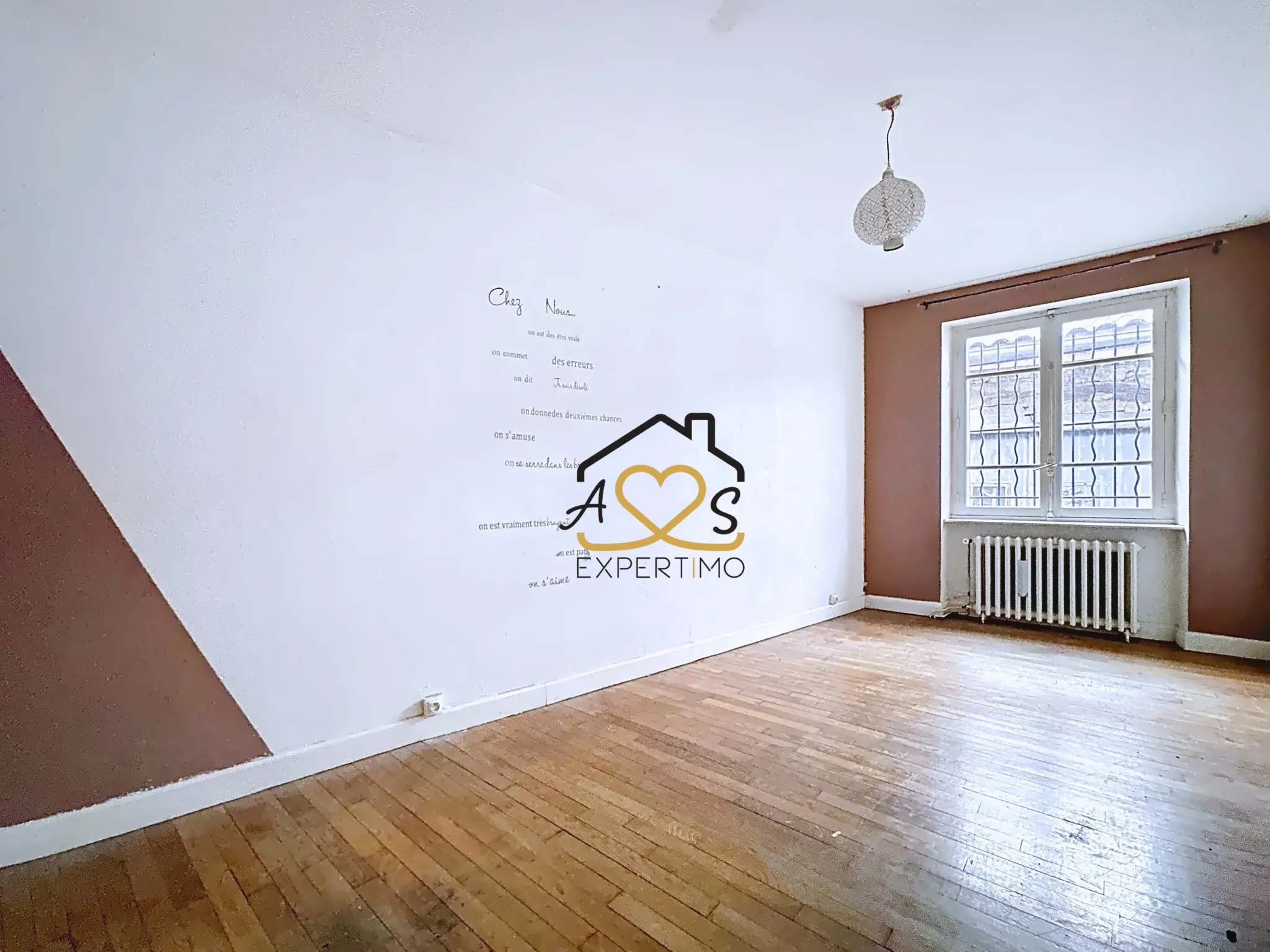 Maison de ville à rénover à Billom avec garage et annexes - 117 m² 