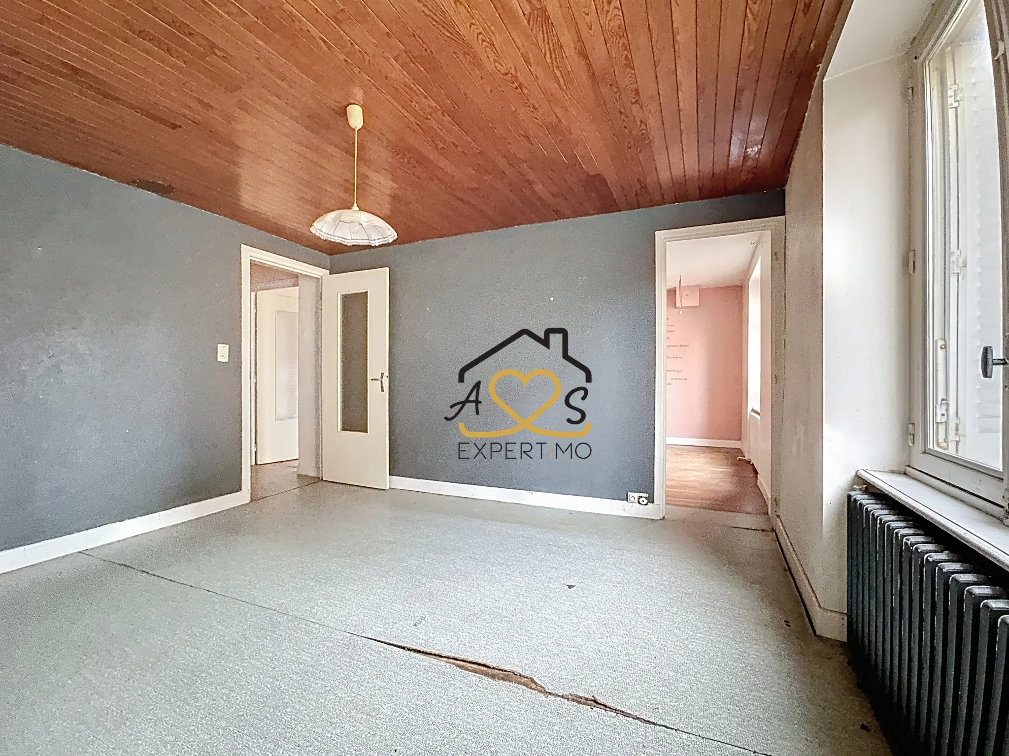 Maison de ville à rénover à Billom avec garage et annexes - 117 m² 