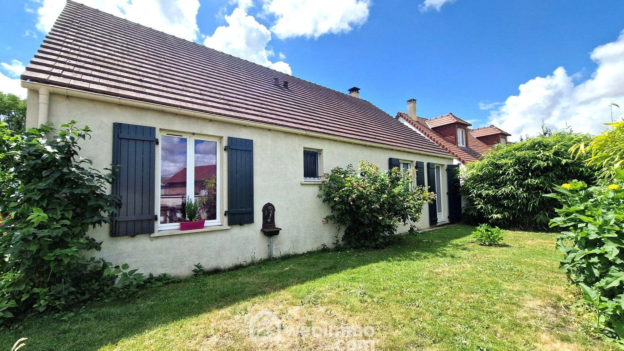 Maison de plain-pied à vendre à Laon avec véranda et jardin