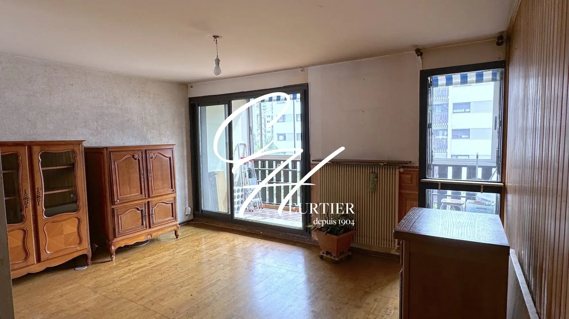 Appartement T4+C à Grenoble avec loggia et cave, secteur calme et proche commodités
