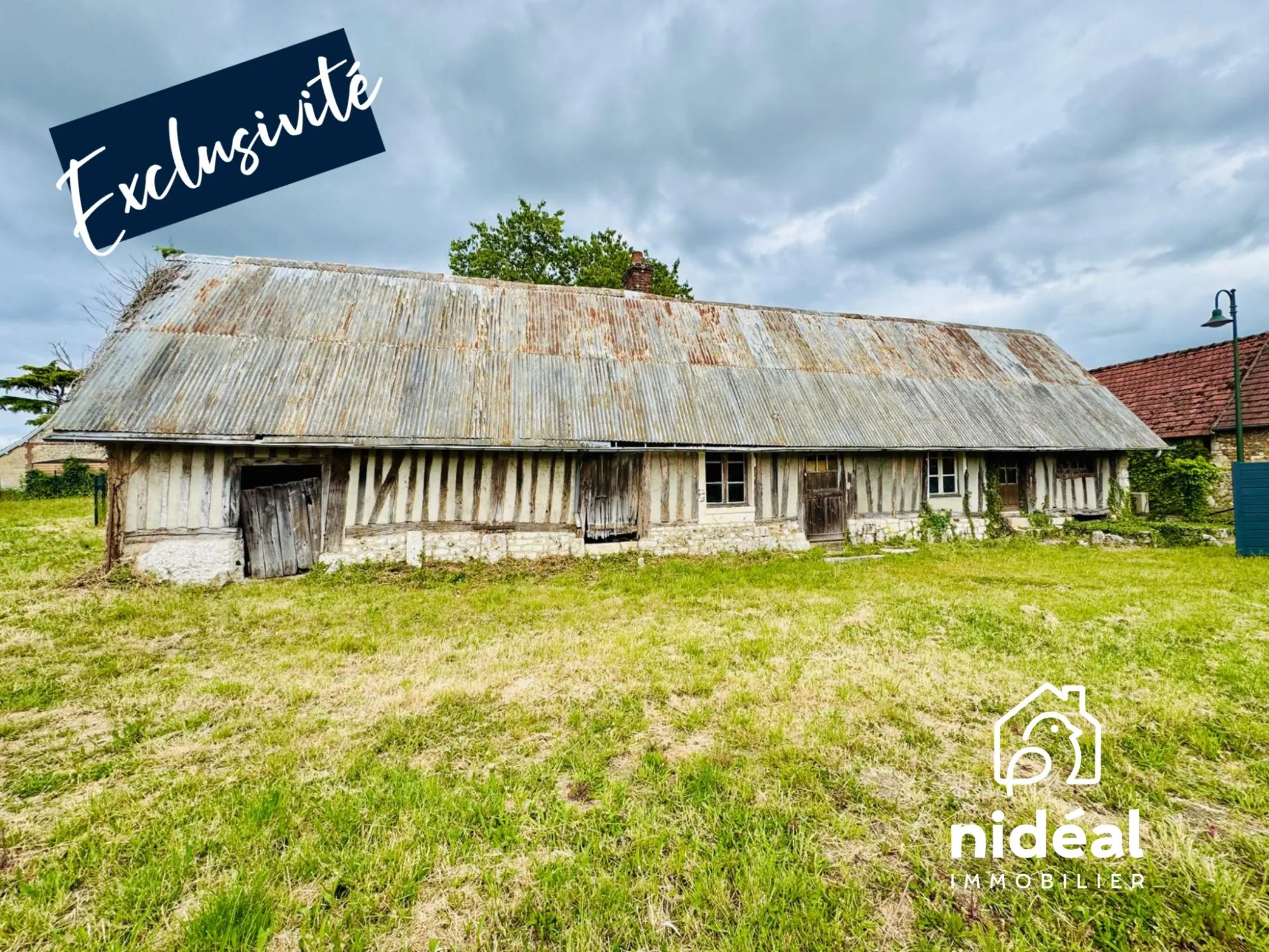 Grande grange à réhabiliter avec terrain à Amfreville-sur-Iton