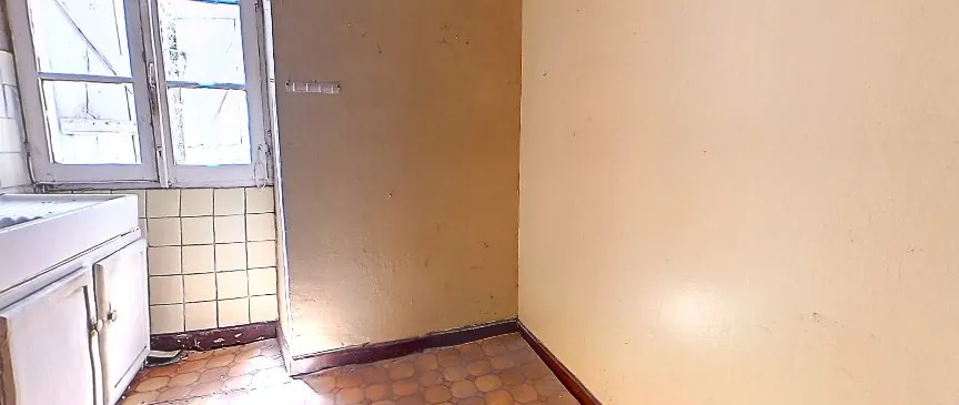 Appartement T5 à vendre au centre-ville d'Oloron-Sainte-Marie avec fort potentiel 