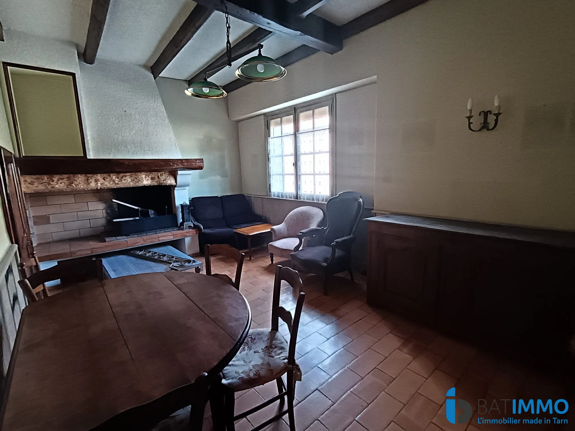 Maison de ville à rénover avec garage et jardinet à Mazamet 