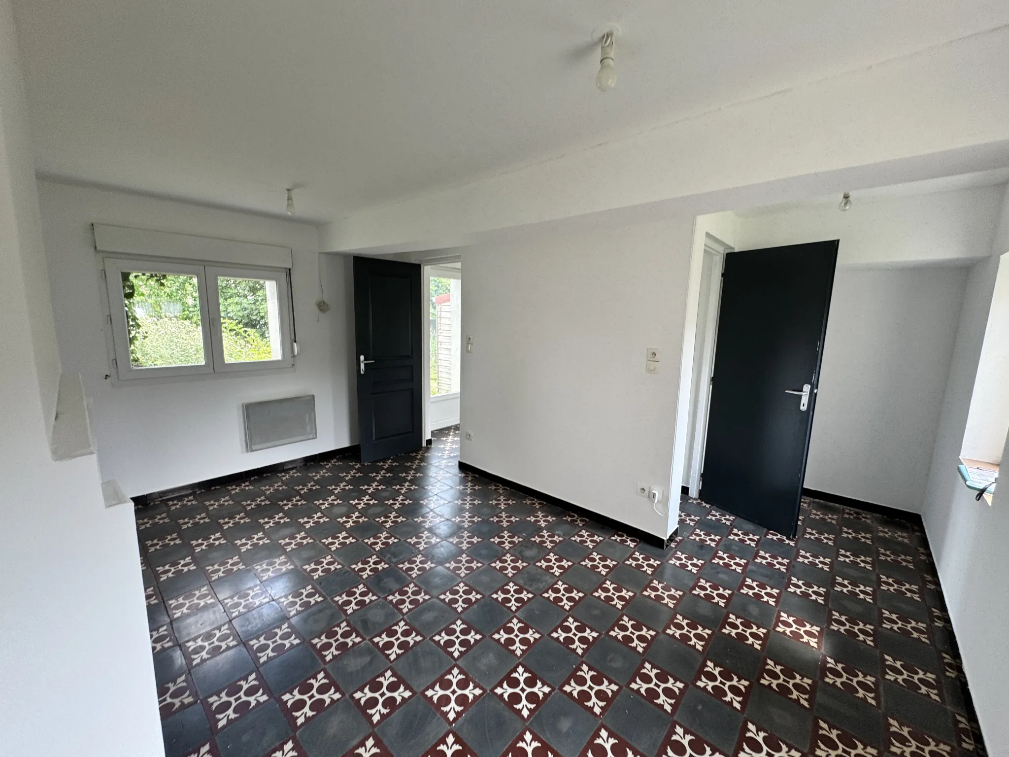 Maison à vendre à Wallers avec jardin, garage et potentiel d’extension