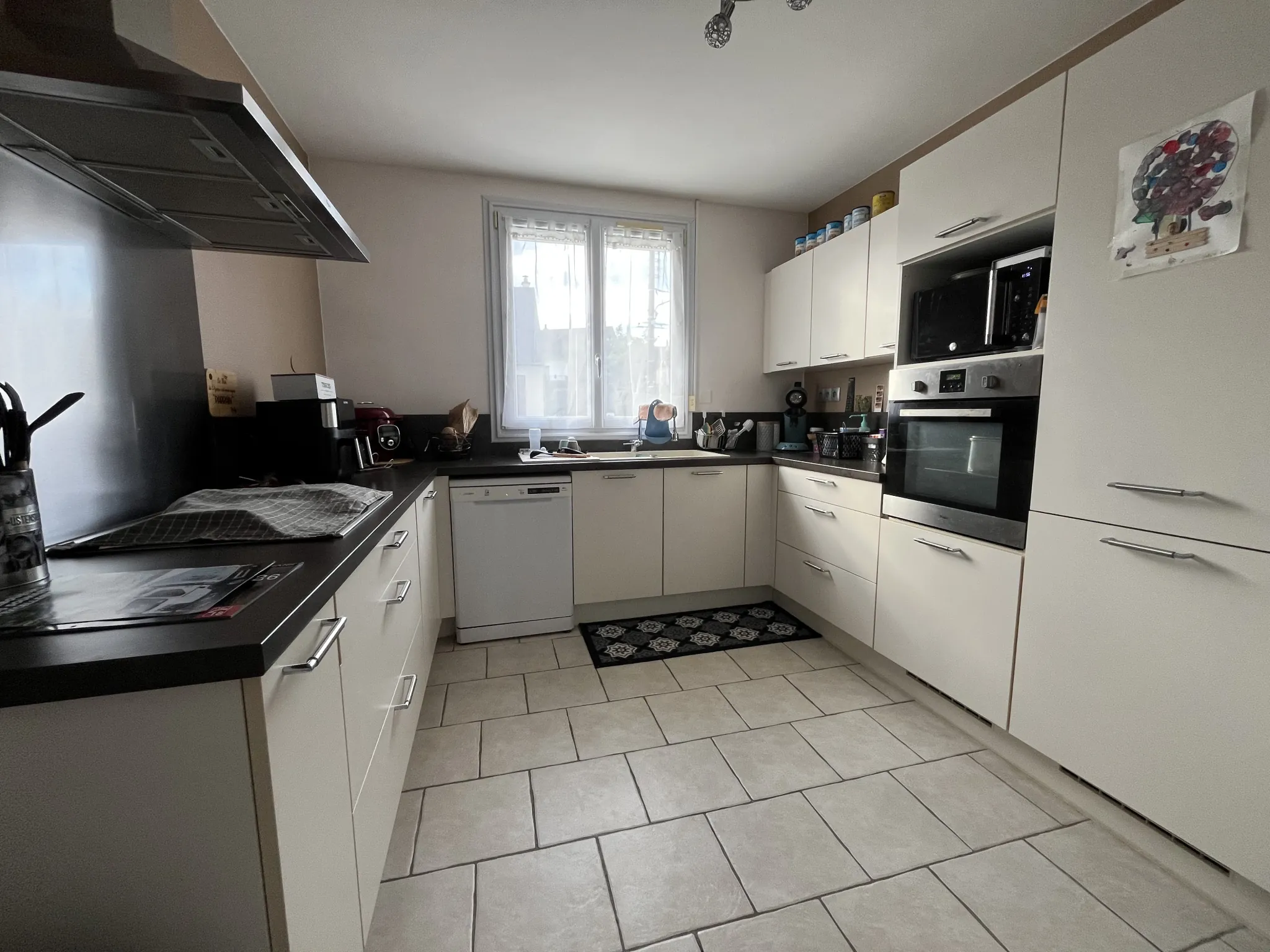 Maison de 93 m² à Le Mans avec jardin, garage et 3 chambres 