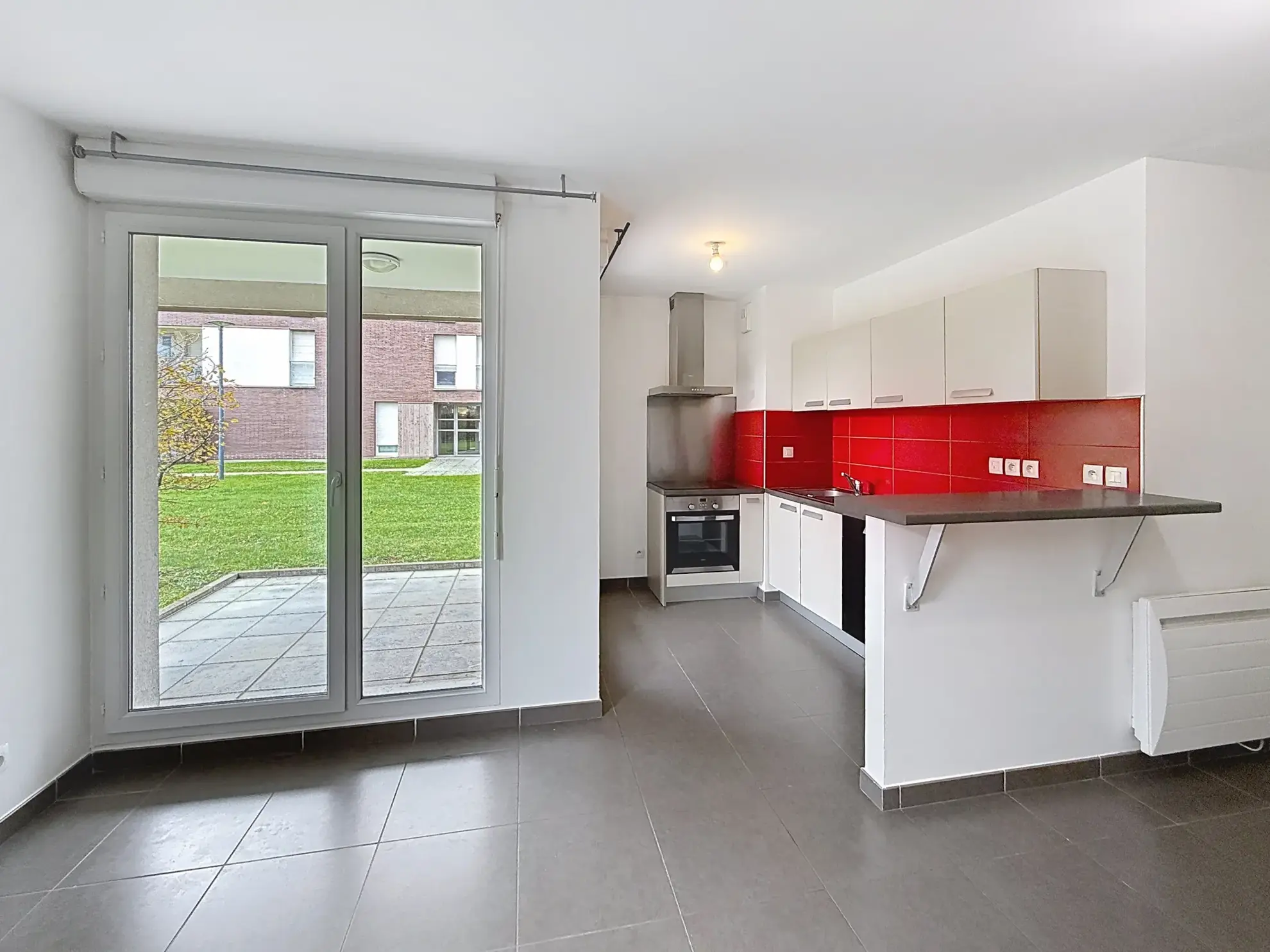 Appartement avec jardin privé à Tourcoing proche Mouvaux - 50 m², terrasse, sécurisé