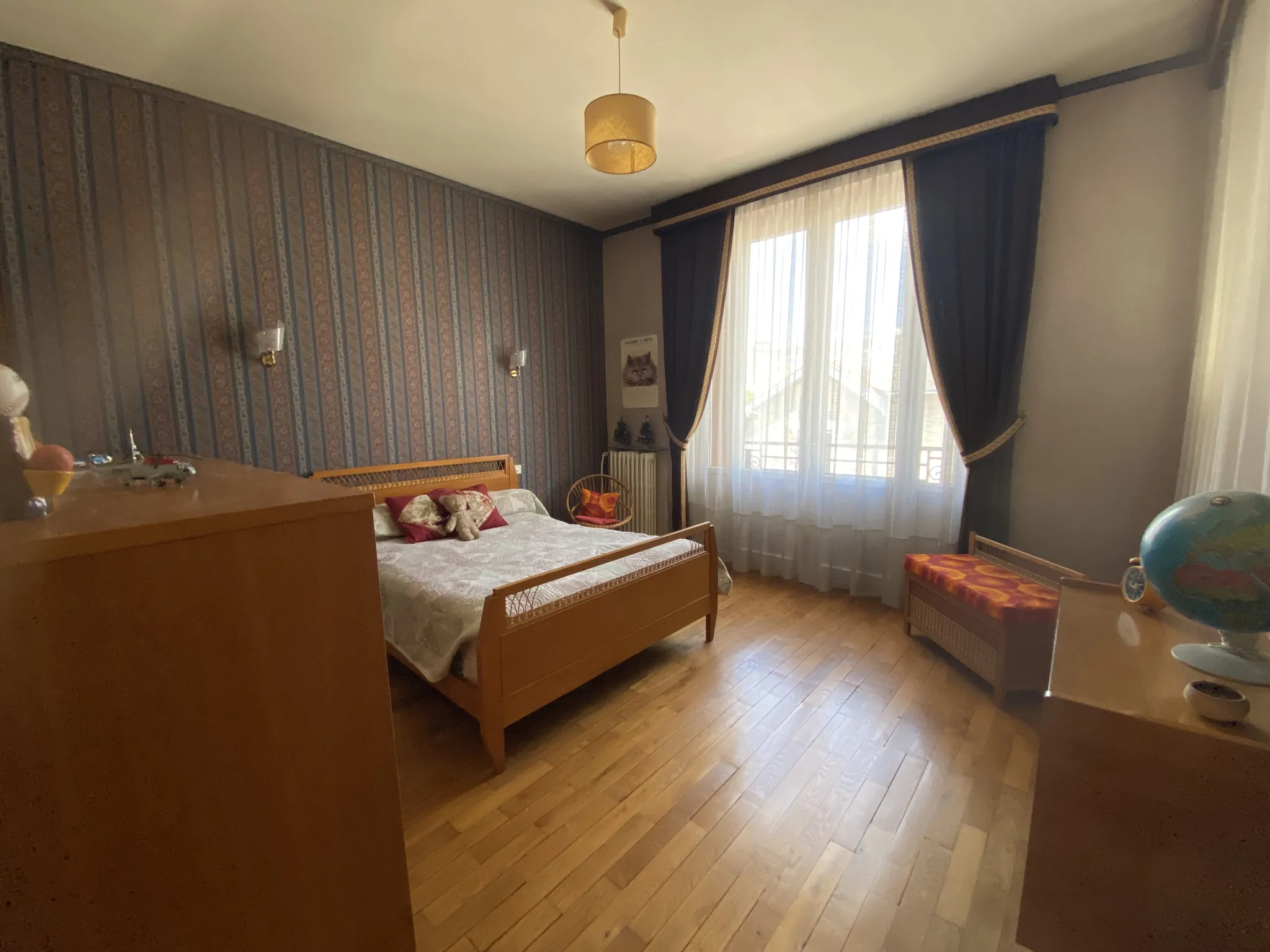 Maison d'architecte à Limoges avec grand séjour, jardin et potentiel de modernisation 