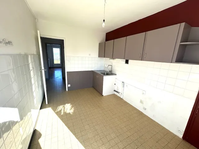 Appartement T4 avec balcon, garage et cave à Firminy - Investissement ou résidence principale 