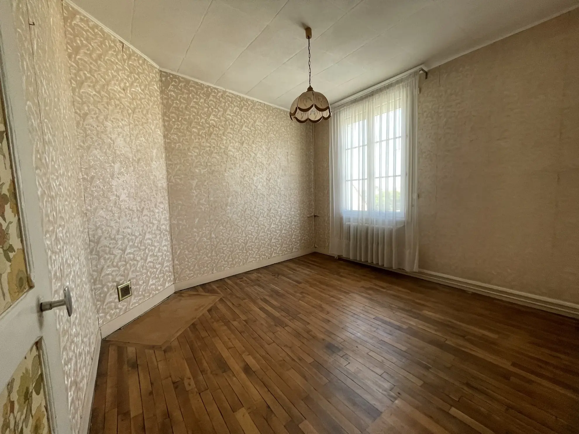 Maison à vendre au Le Mans secteur Maroc / Geneslay avec jardin et garage 