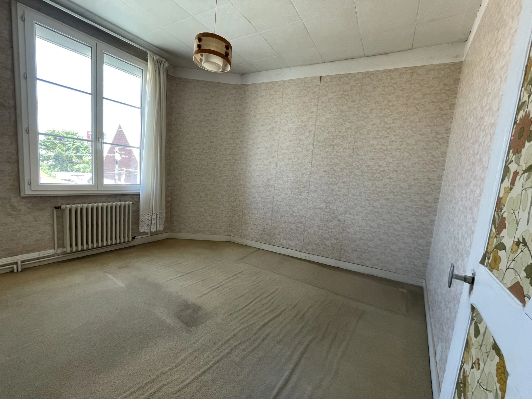 Maison à vendre au Le Mans secteur Maroc / Geneslay avec jardin et garage 