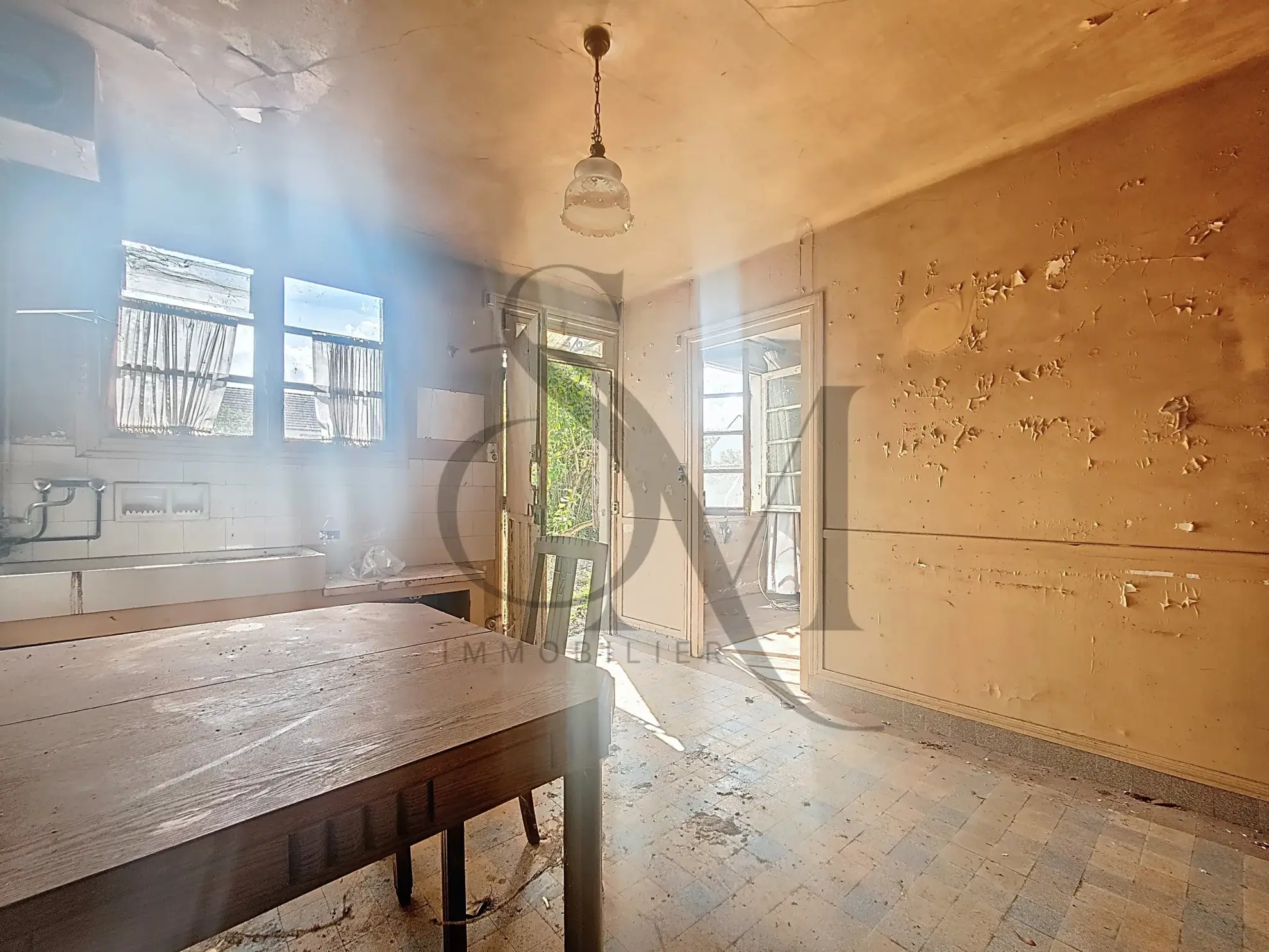 Maison à rénover à Amilly (45200) avec grand potentiel et terrain de 553 m² 