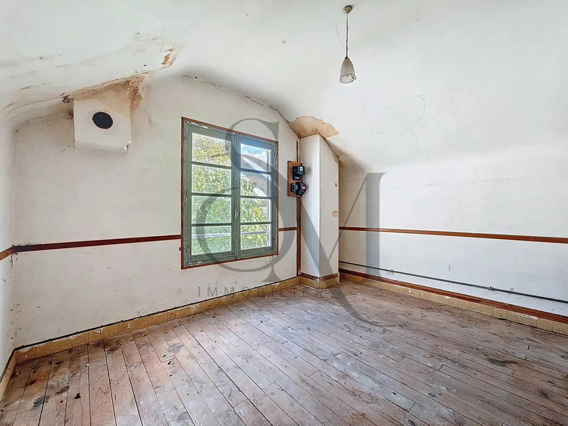 Maison à rénover à Amilly (45200) avec grand potentiel et terrain de 553 m² 