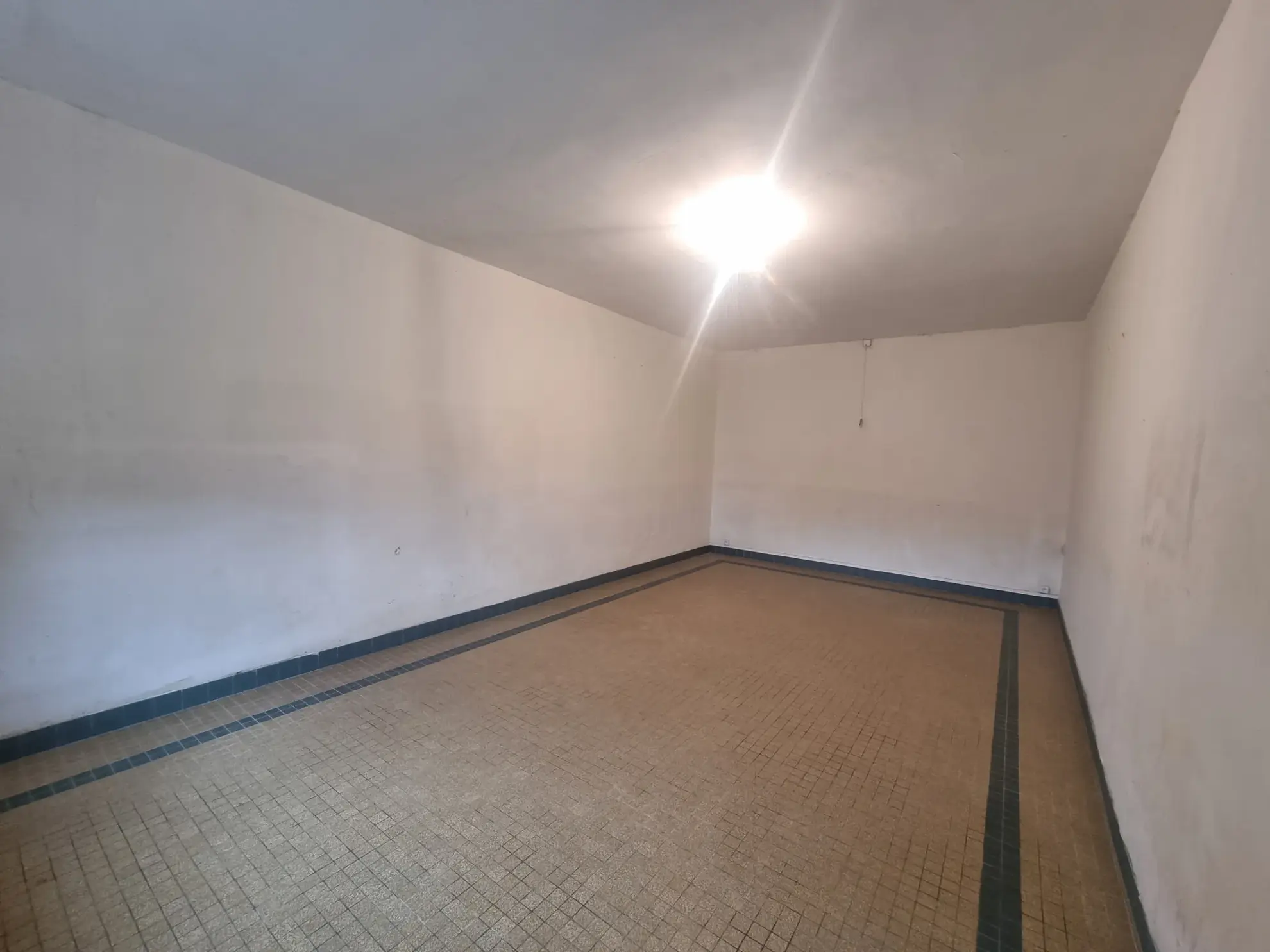 Maison à vendre au Mêle-sur-Sarthe de 61 m² avec garage et terrain de 600 m² 