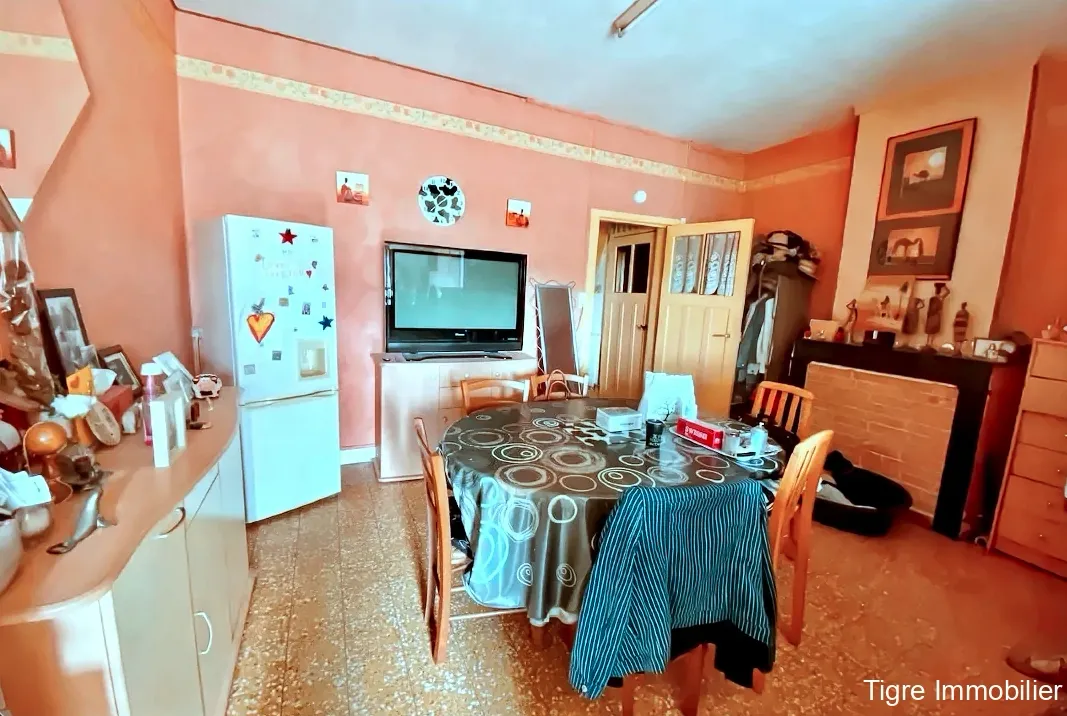 Maison à rénover avec terrain à Feignies - Opportunité d'investissement 