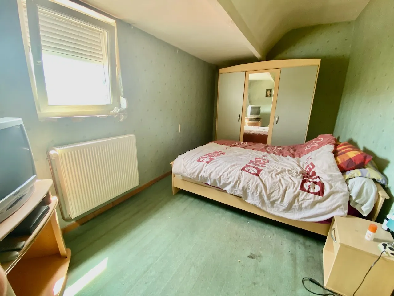 Maison à rénover avec terrain à Feignies - Opportunité d'investissement 