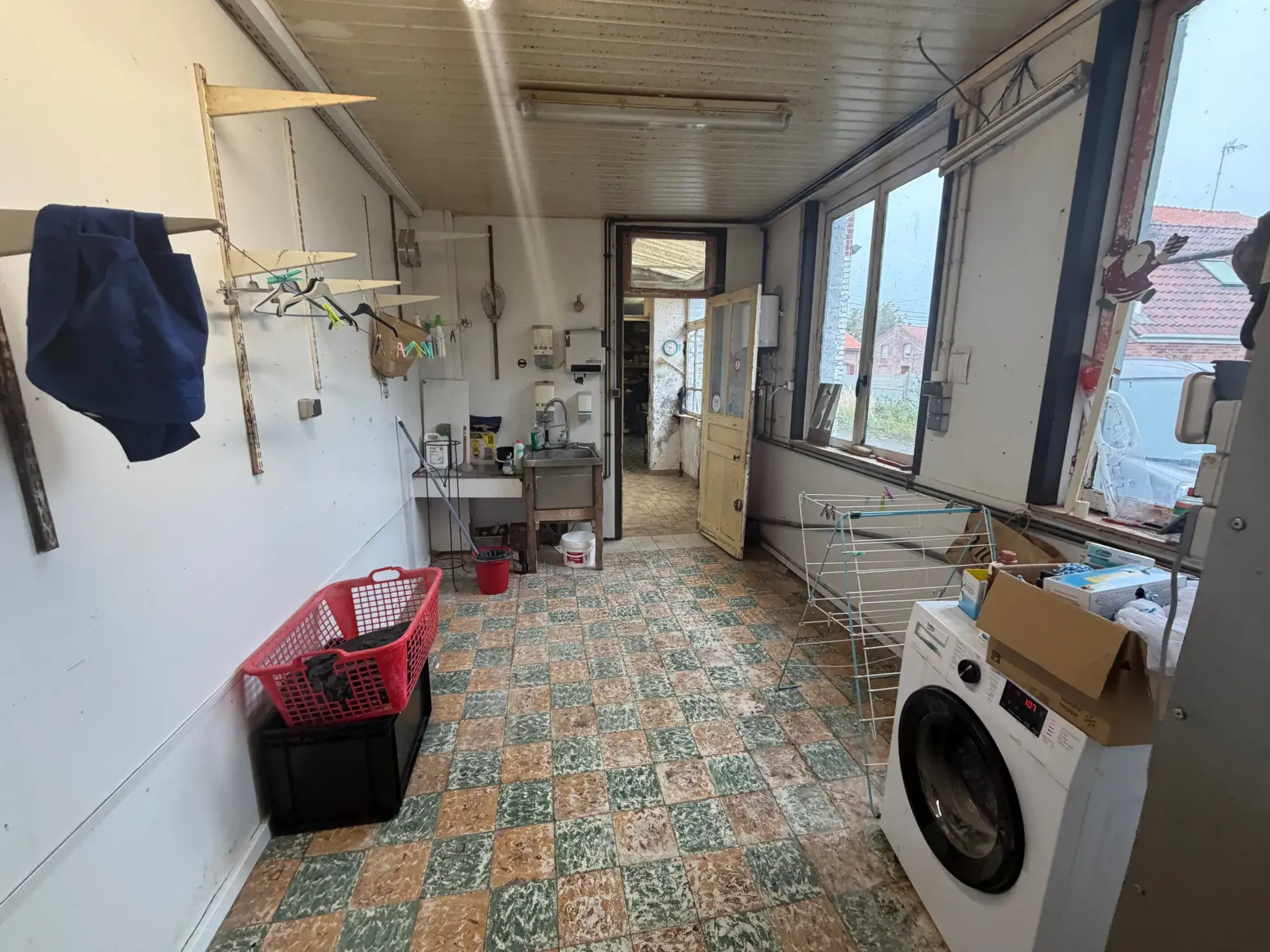 Ensemble immobilier à Wallers avec deux maisons et hangar – Opportunité d'investissement 