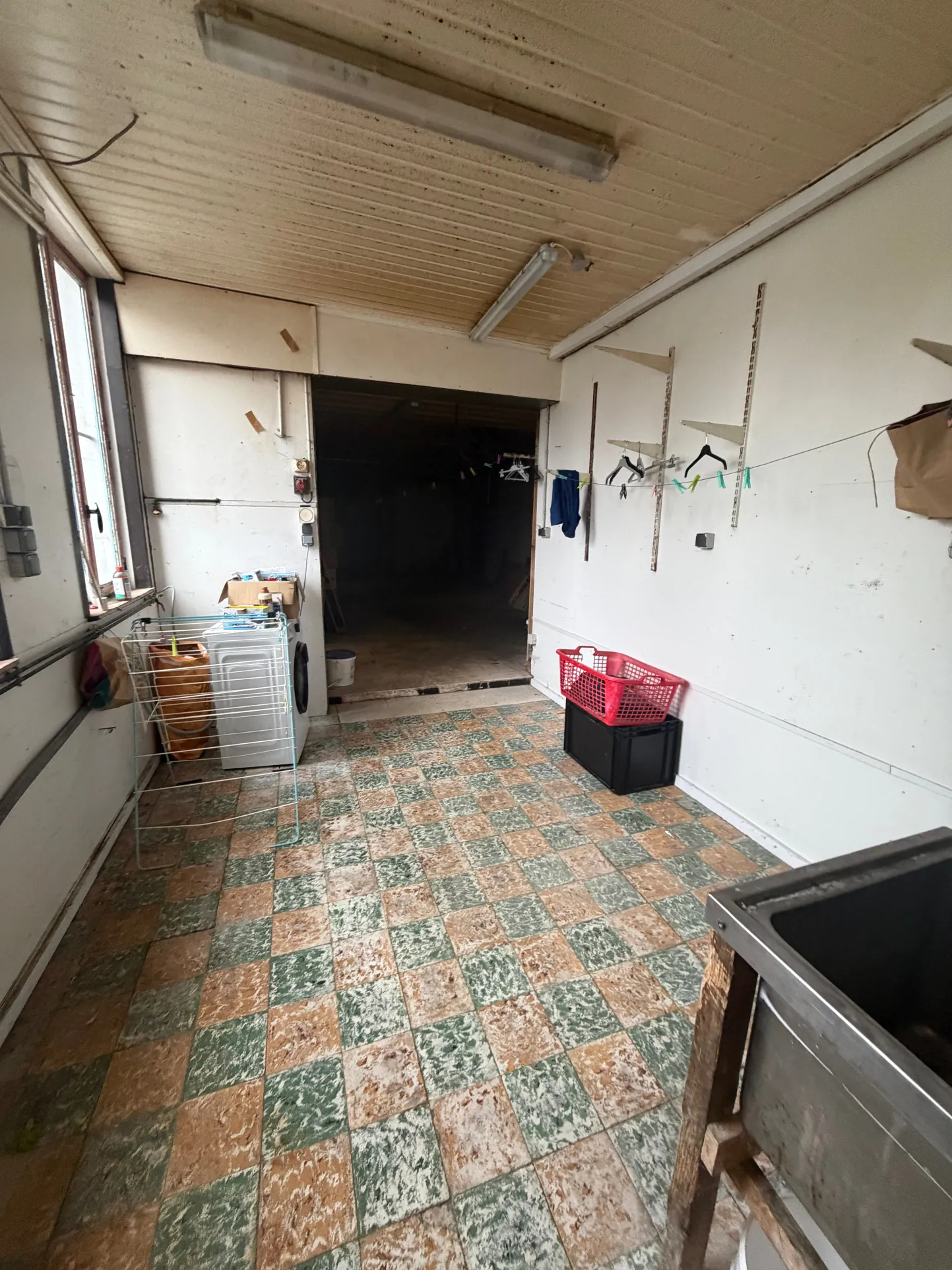 Ensemble immobilier à Wallers avec deux maisons et hangar – Opportunité d'investissement 