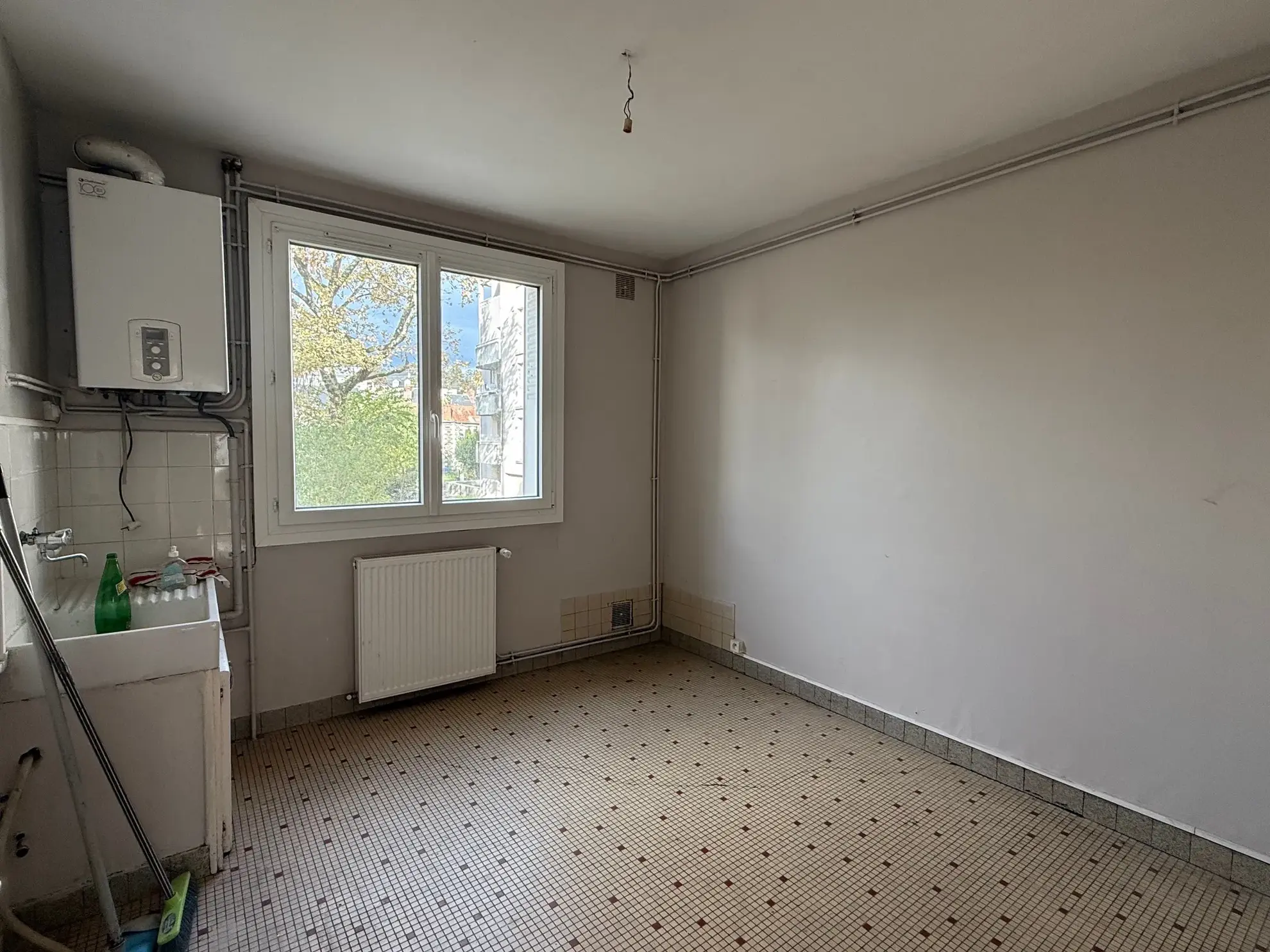 Appartement à vendre à Brive avec garage, cave et jardin privé 