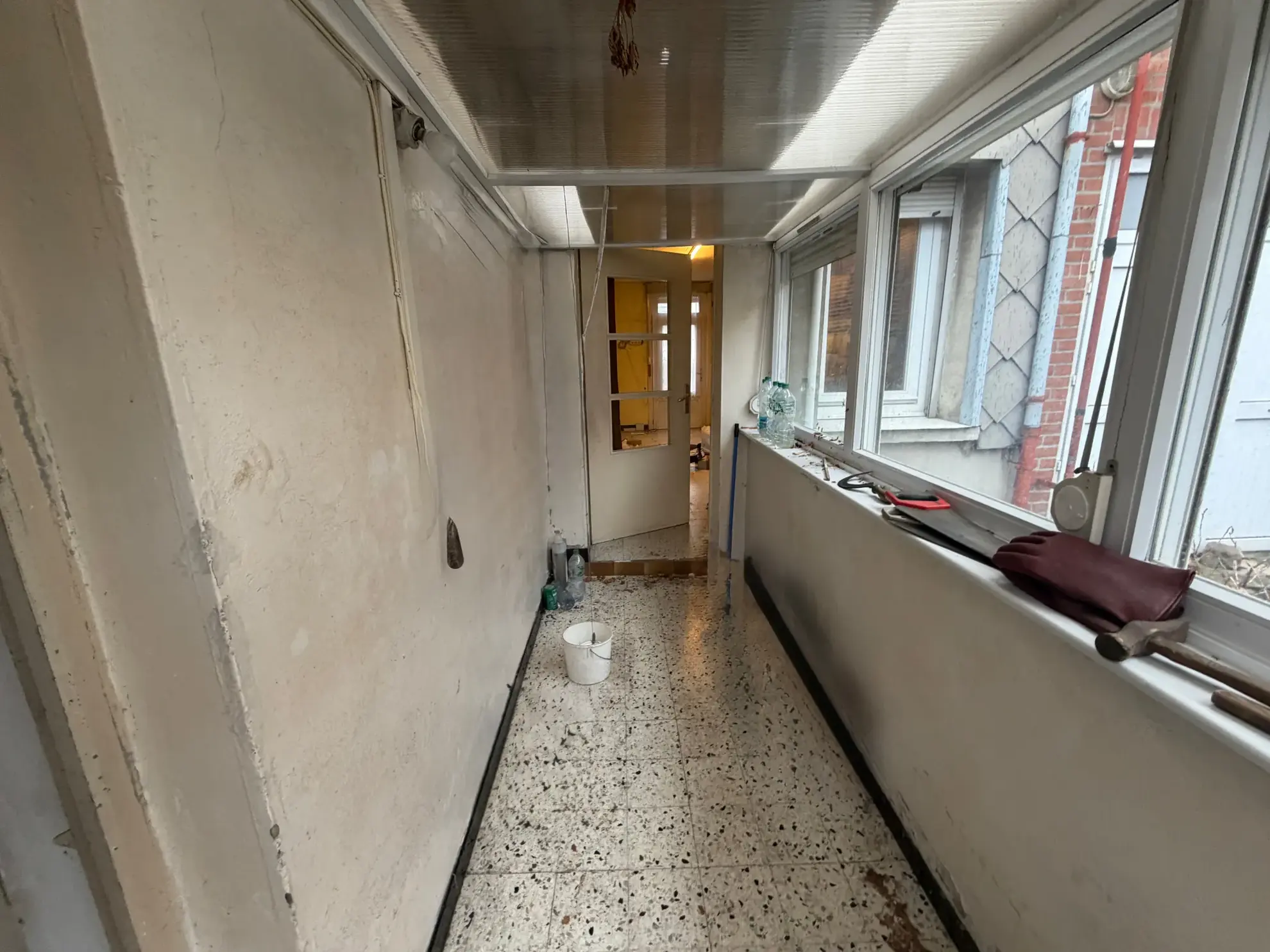 Maison à Haveluy avec garage, jardin et potentiel de rénovation 