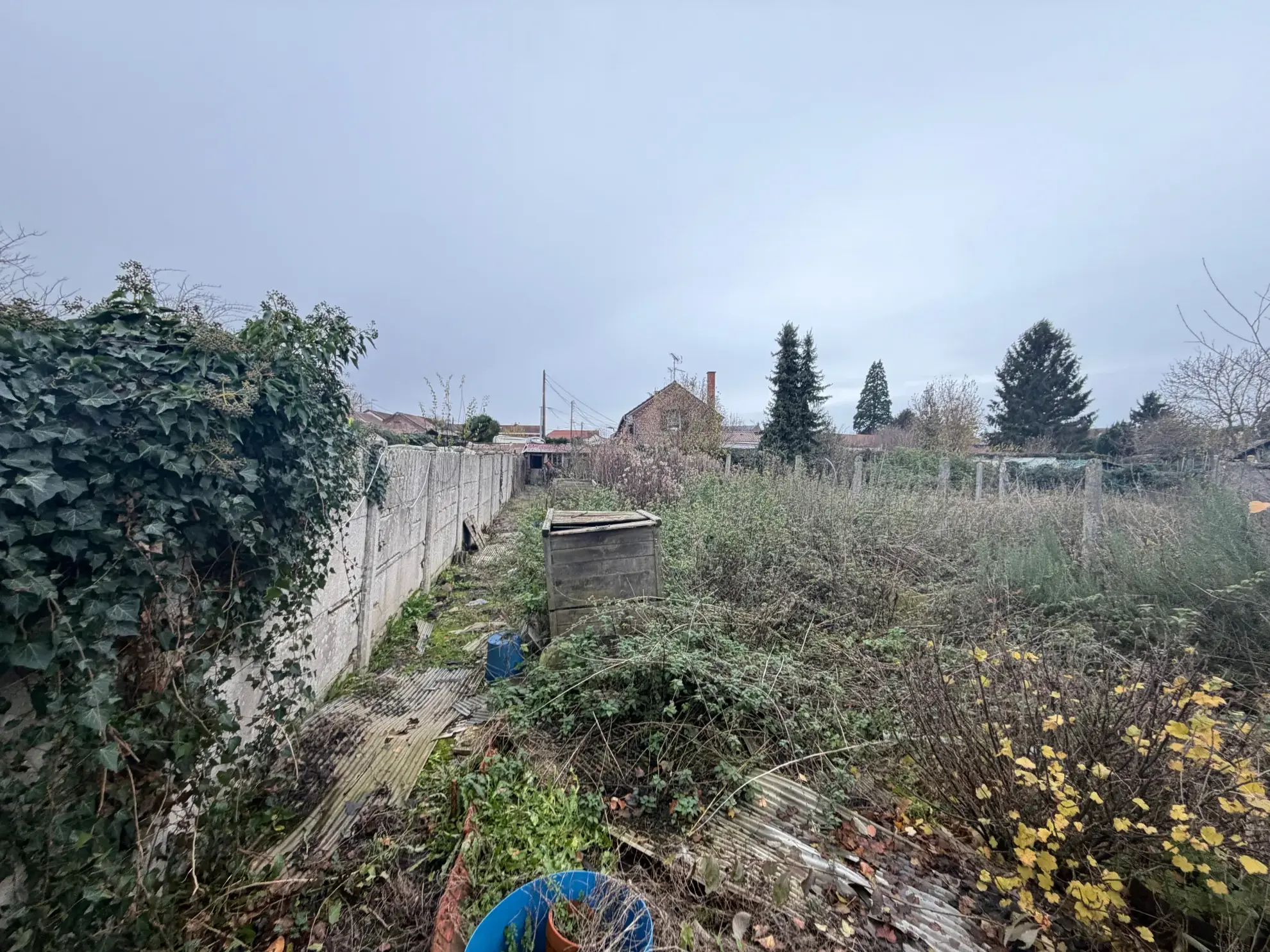 Maison à Haveluy avec garage, jardin et potentiel de rénovation 