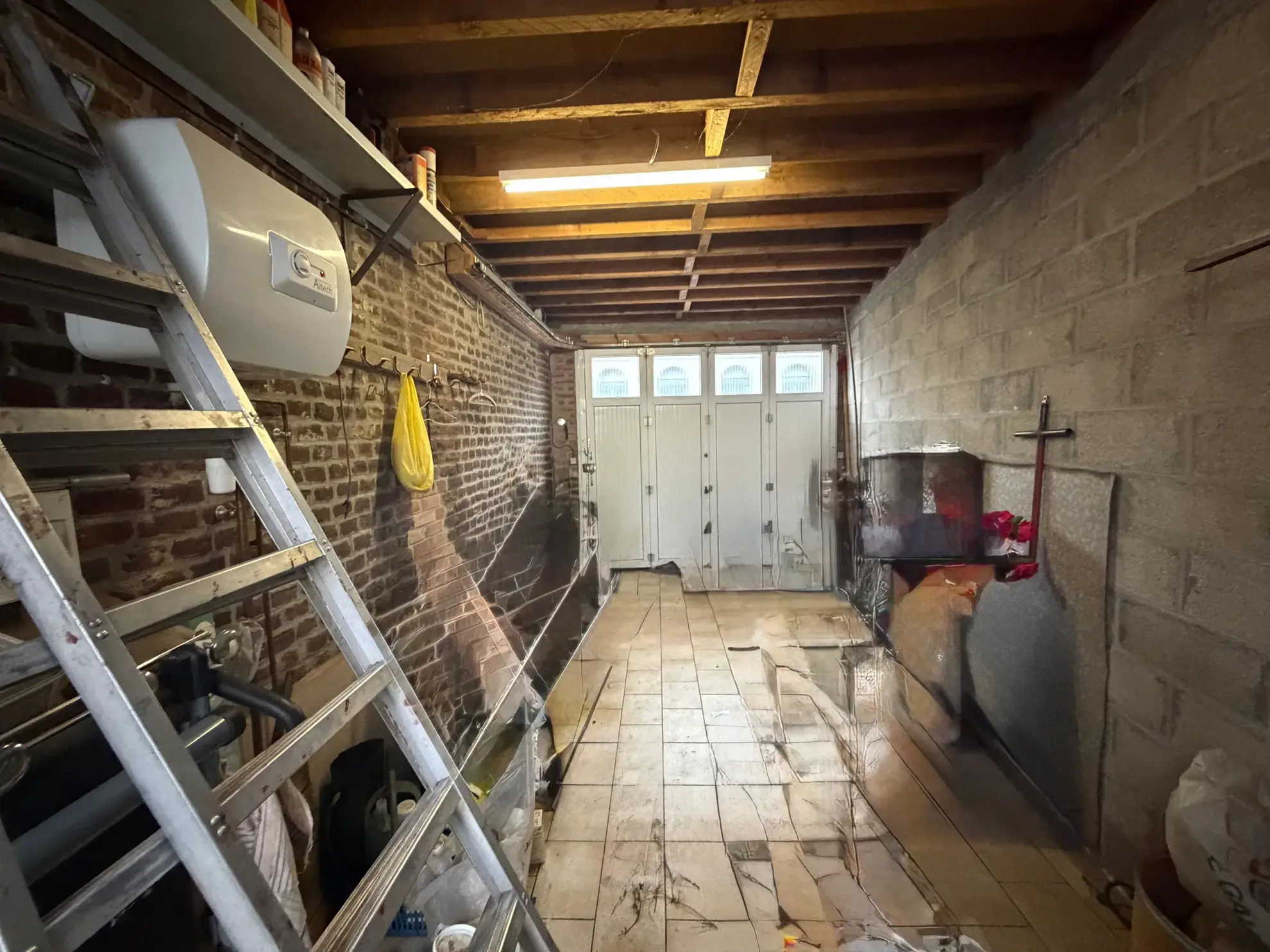 Maison à Haveluy avec garage, jardin et potentiel de rénovation 