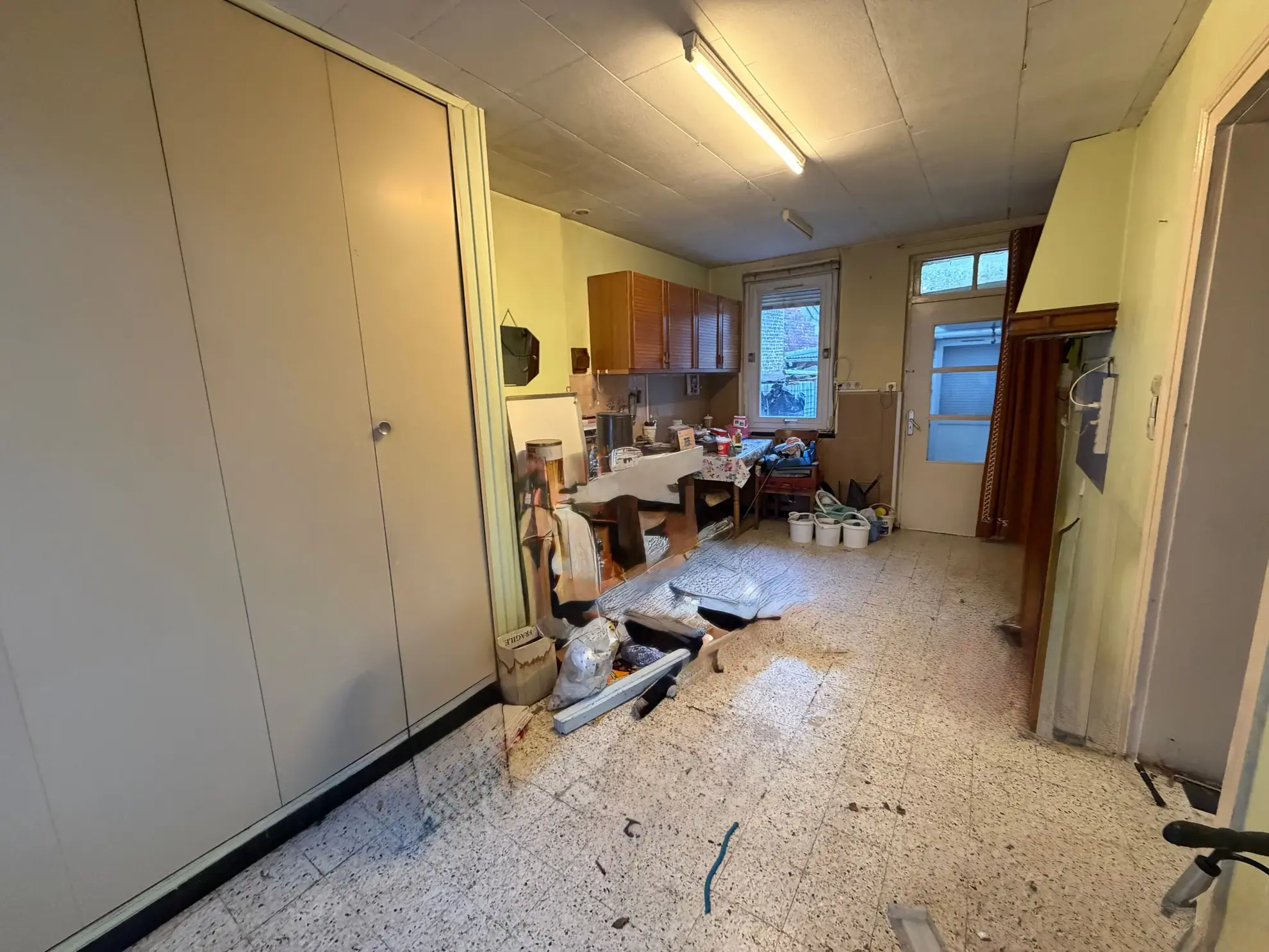 Maison à Haveluy avec garage, jardin et potentiel de rénovation 