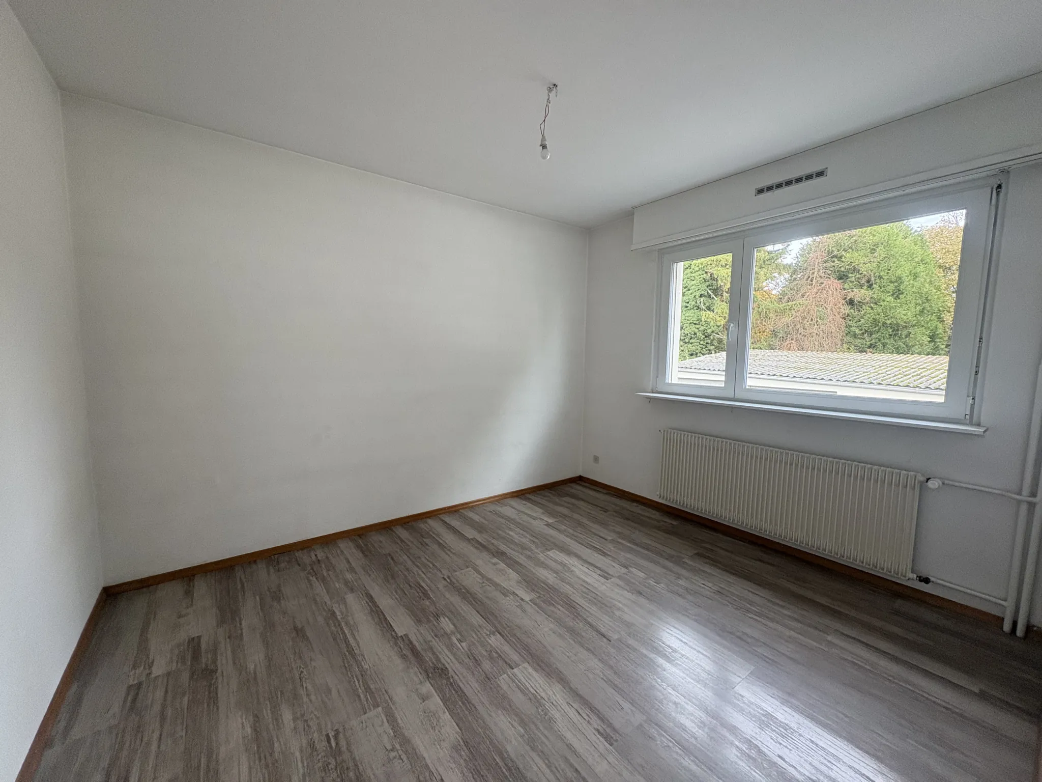 Appartement F4 lumineux de 91,69 m² à Lutterbach avec garage et cave 