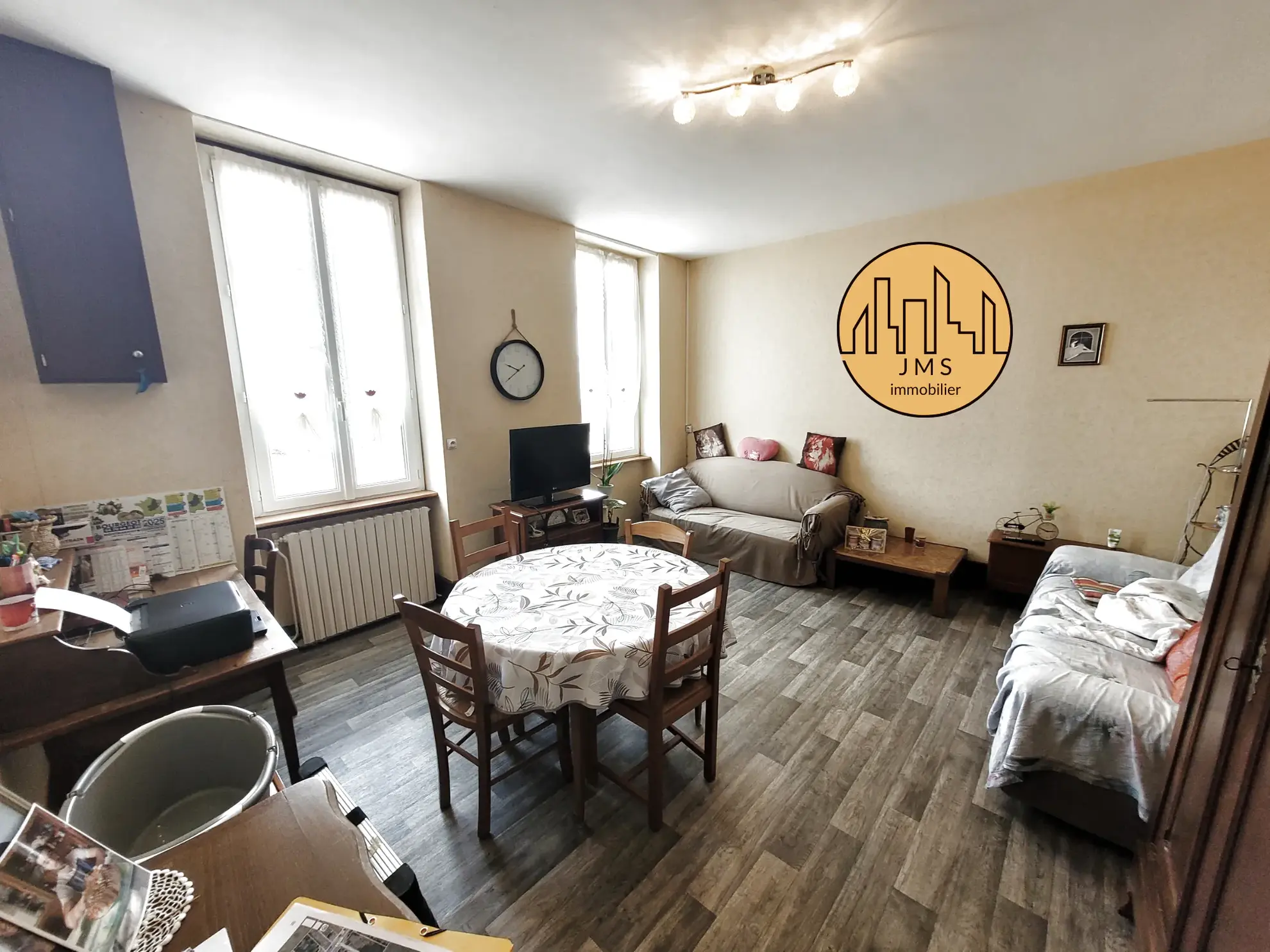 Maison mitoyenne avec jardin à Montmarault - Opportunité d’investissement