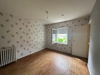 Maison de plain-pied à Baugy avec dépendances et terrain constructible 