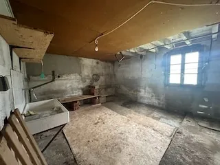 Maison de plain-pied à Baugy avec dépendances et terrain constructible 