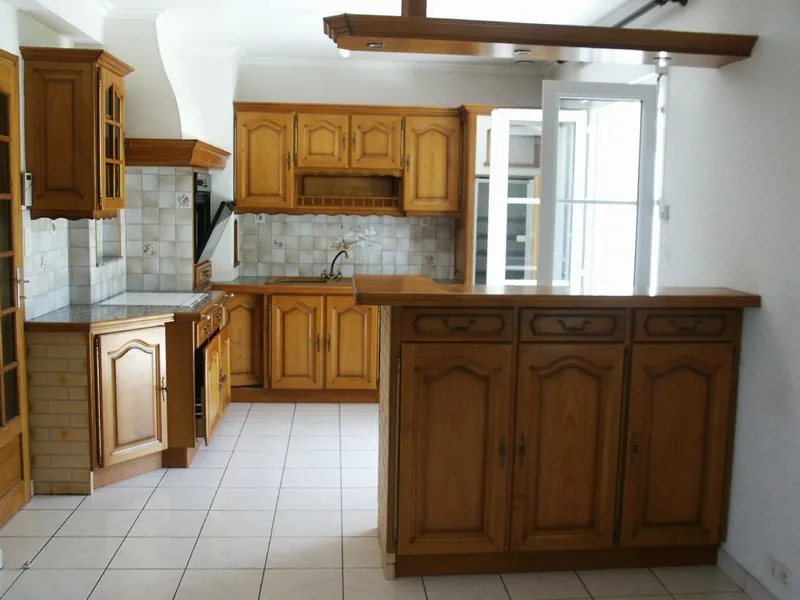 Maison 6 pièces à Guer centre-ville - 107 m² avec sous-sol et terrasse 