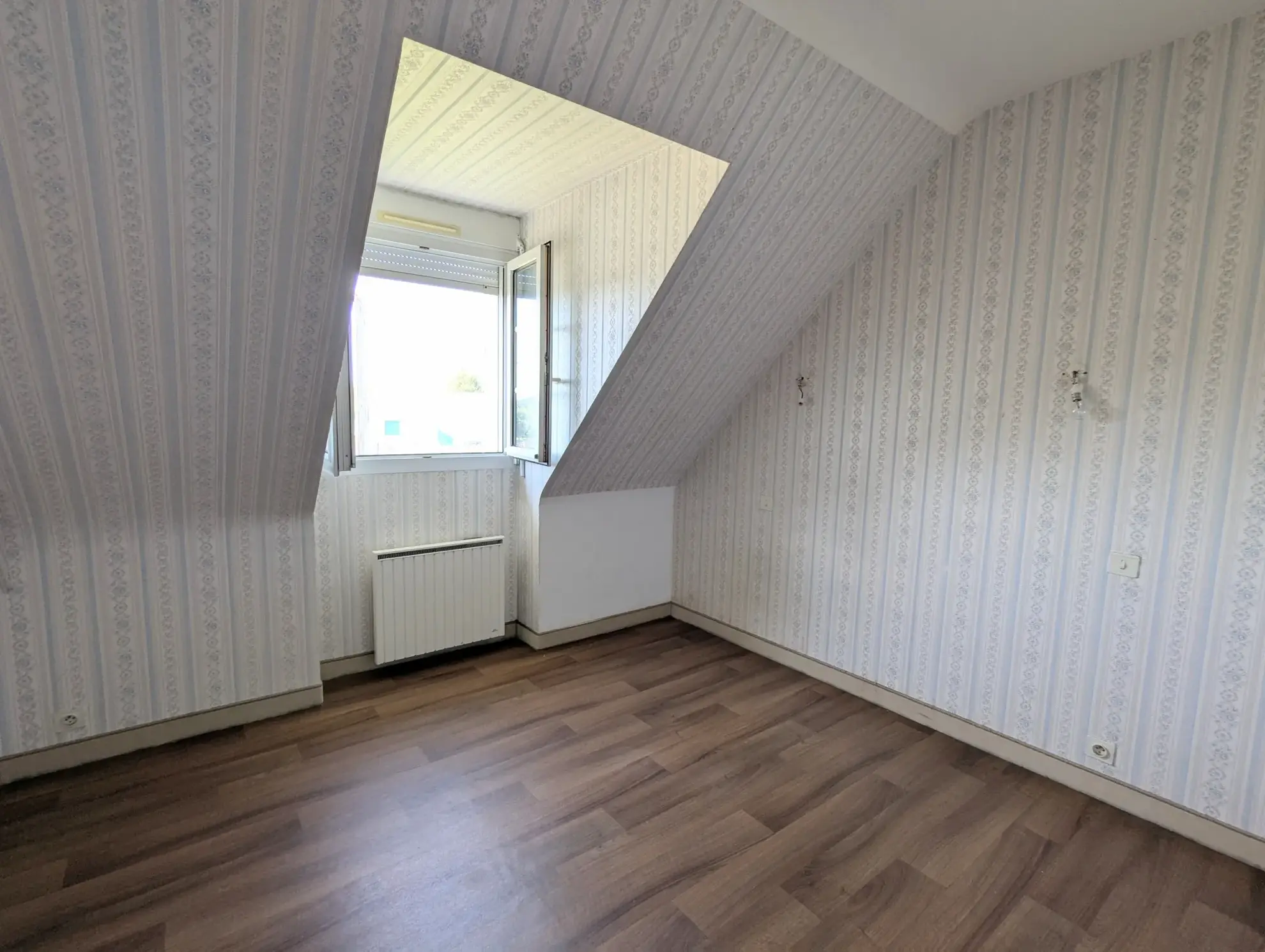 Maison 6 pièces à Guer centre-ville - 107 m² avec sous-sol et terrasse 