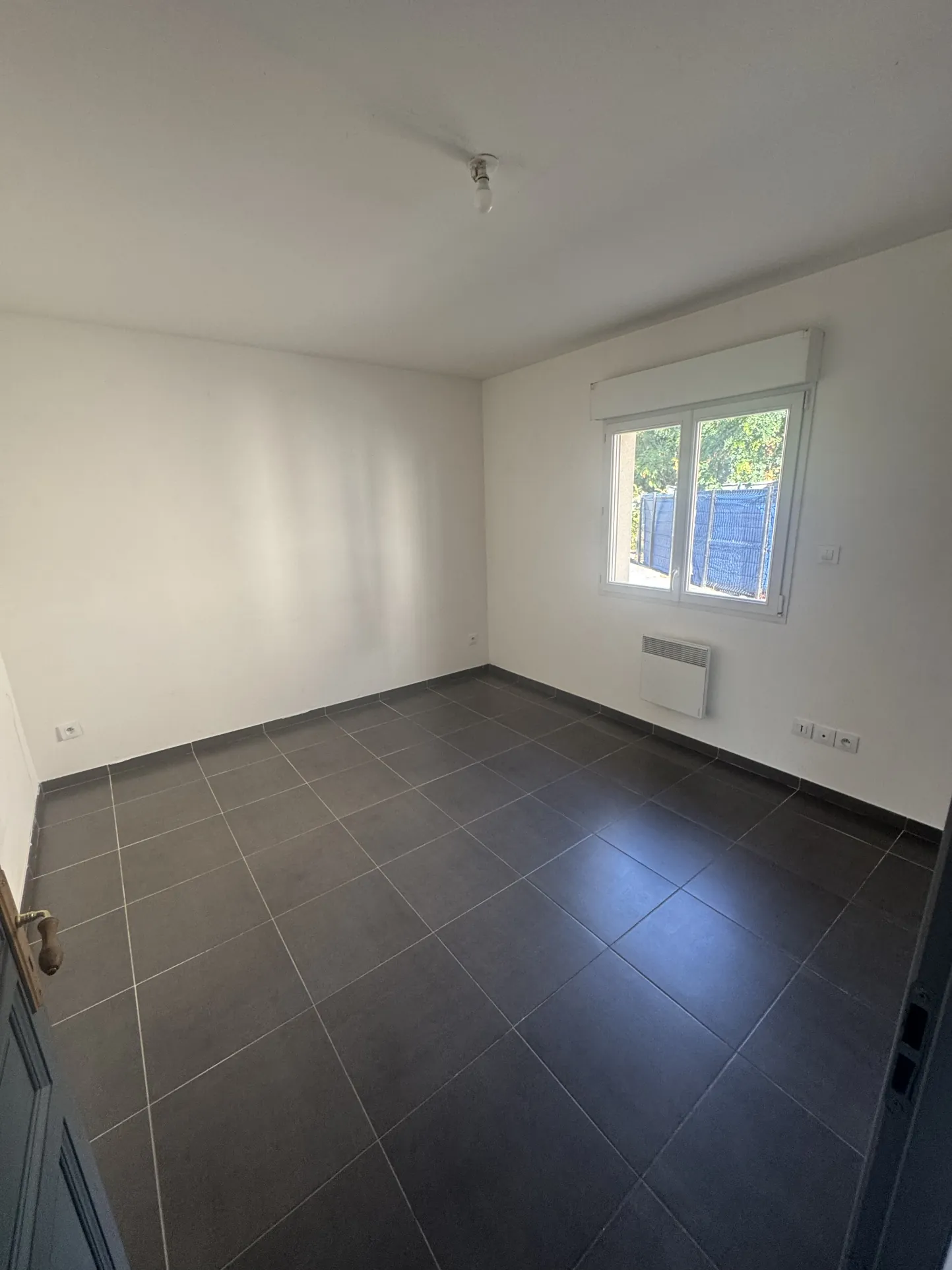 Maison semi plain-pied à vendre à Lens - 3 chambres, jardin et garage 