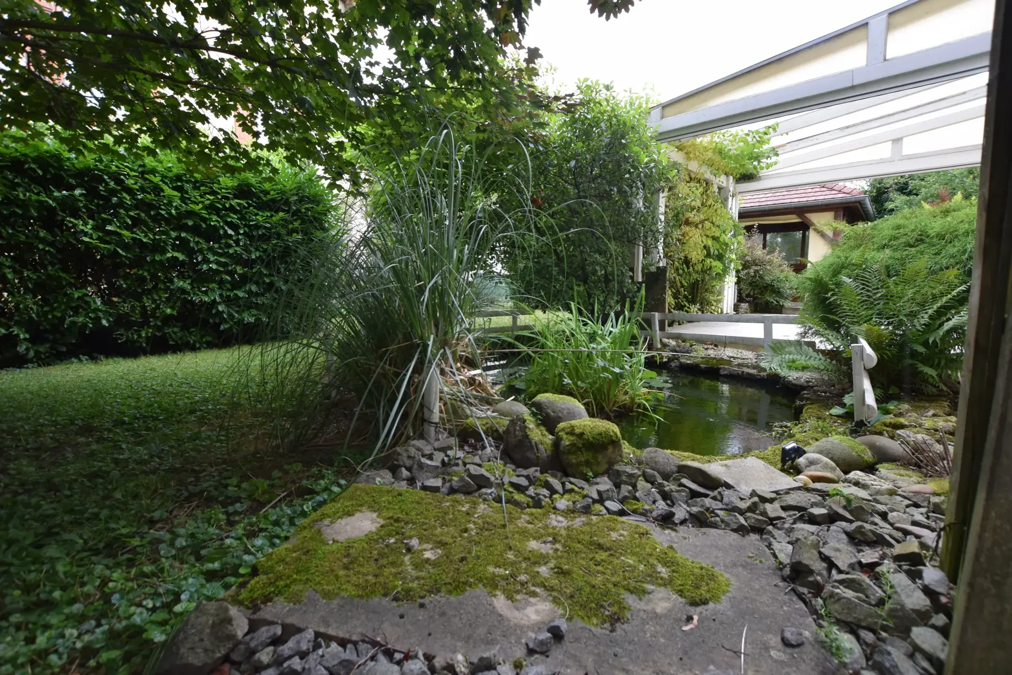 Belle maison de 1882 avec jardin, annexes et potentiel professionnel à Seloncourt