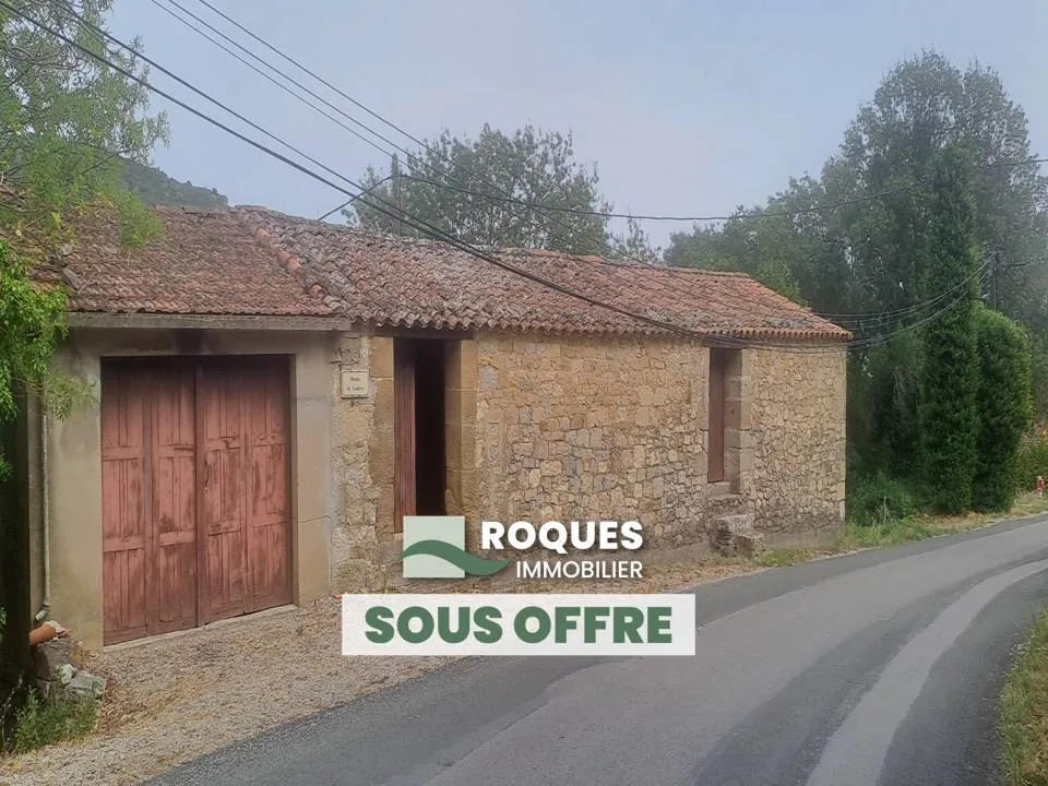 Grande grange en pierre à rénover à Lauroux, 363 m² de terrain