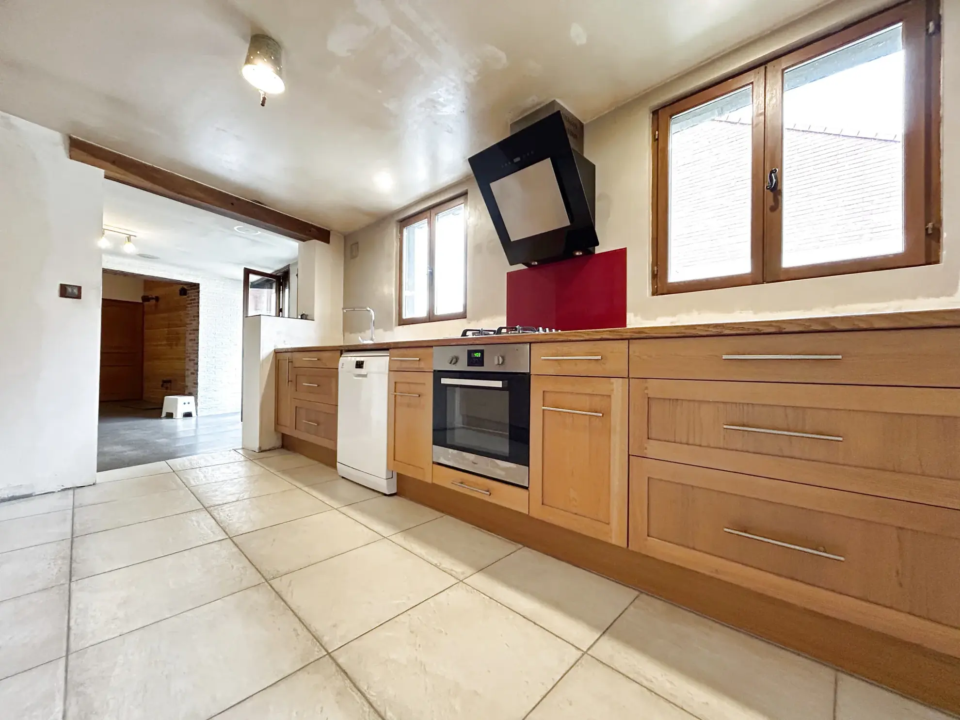 Maison semi-individuelle avec jardin et garage à Drocourt 