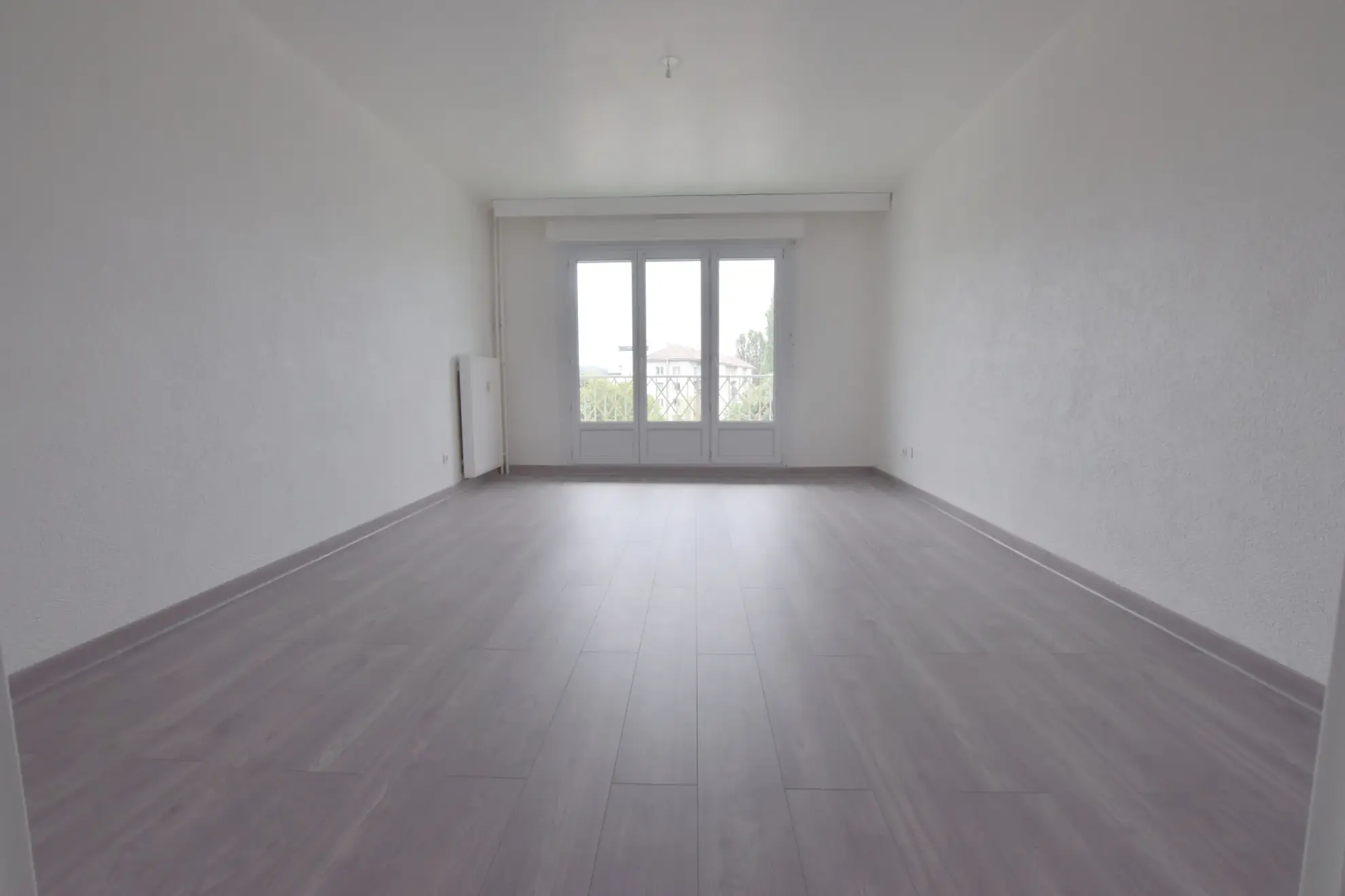 Appartement lumineux avec balcon, cave et garage à Sochaux - Centre-ville 