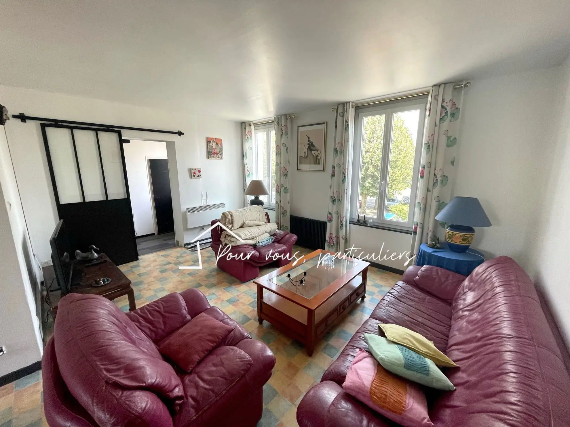 Immeuble de rapport à Raismes avec appartements et local commercial loués 