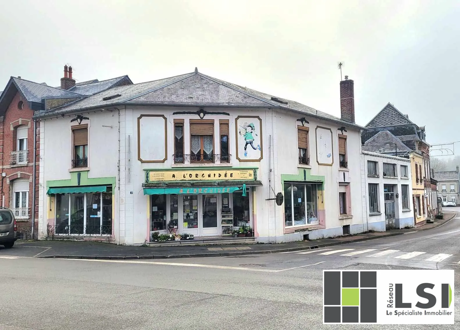 Immeuble d'habitation et local commercial au Nouvion-en-Thiérache