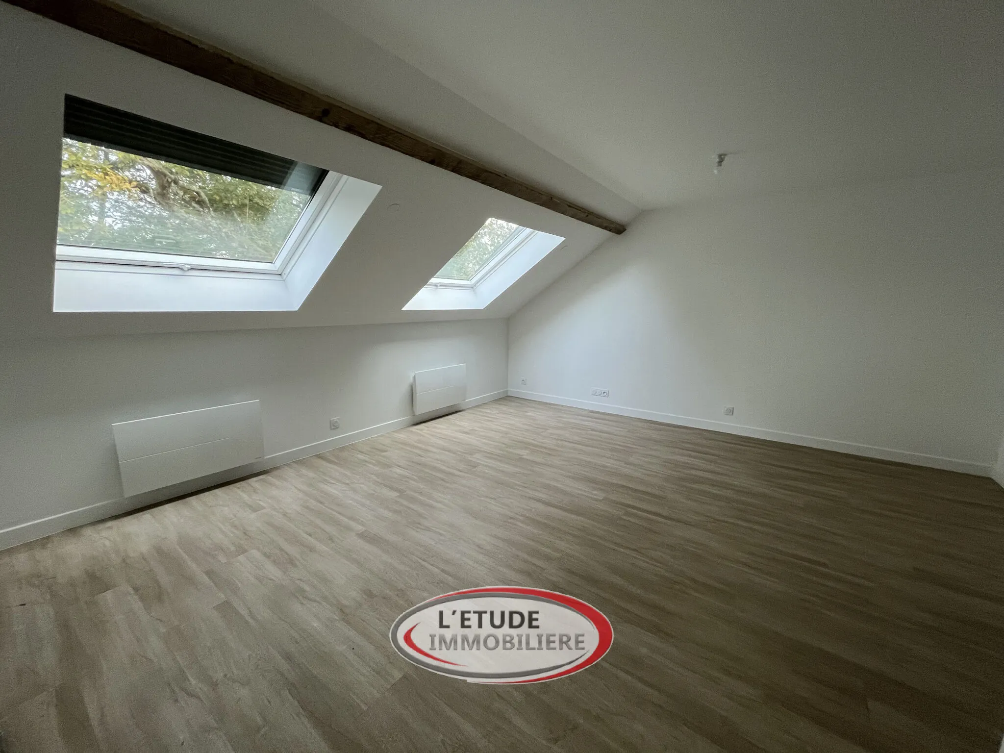 Vente d'un appartement T1 rénové avec deux parking à Sautron, proche Nantes